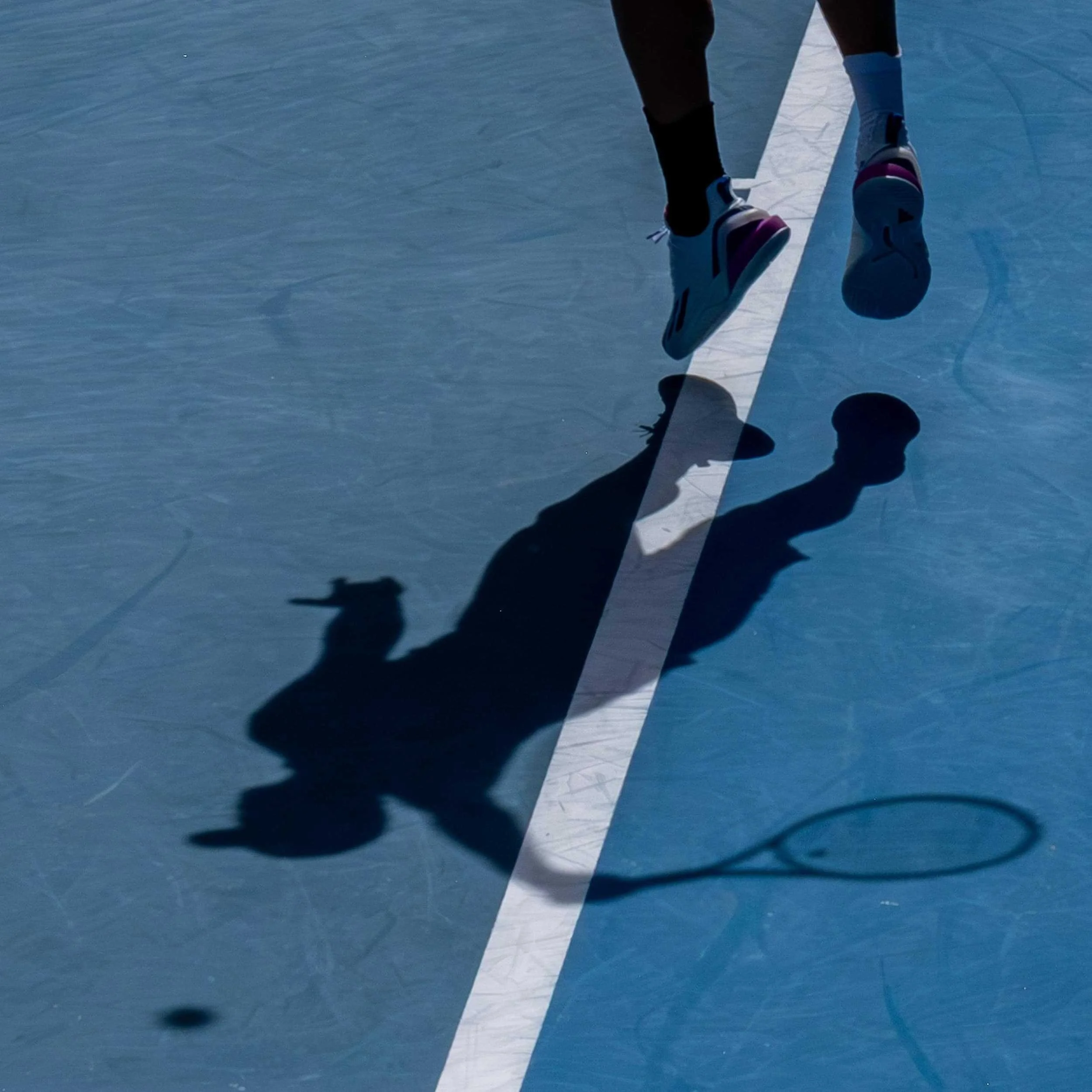 Silhouette of tennis player, Tommy Paul, at the 2025 Australian Open.