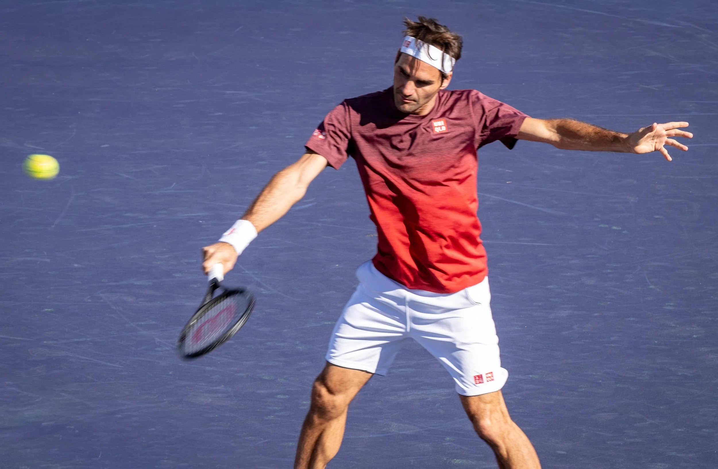Roger Federer hits a slice backhand during a practice session (with Gael Monfils), at the 2019 BNP Paribas Open in Indian Wells, California, USA.