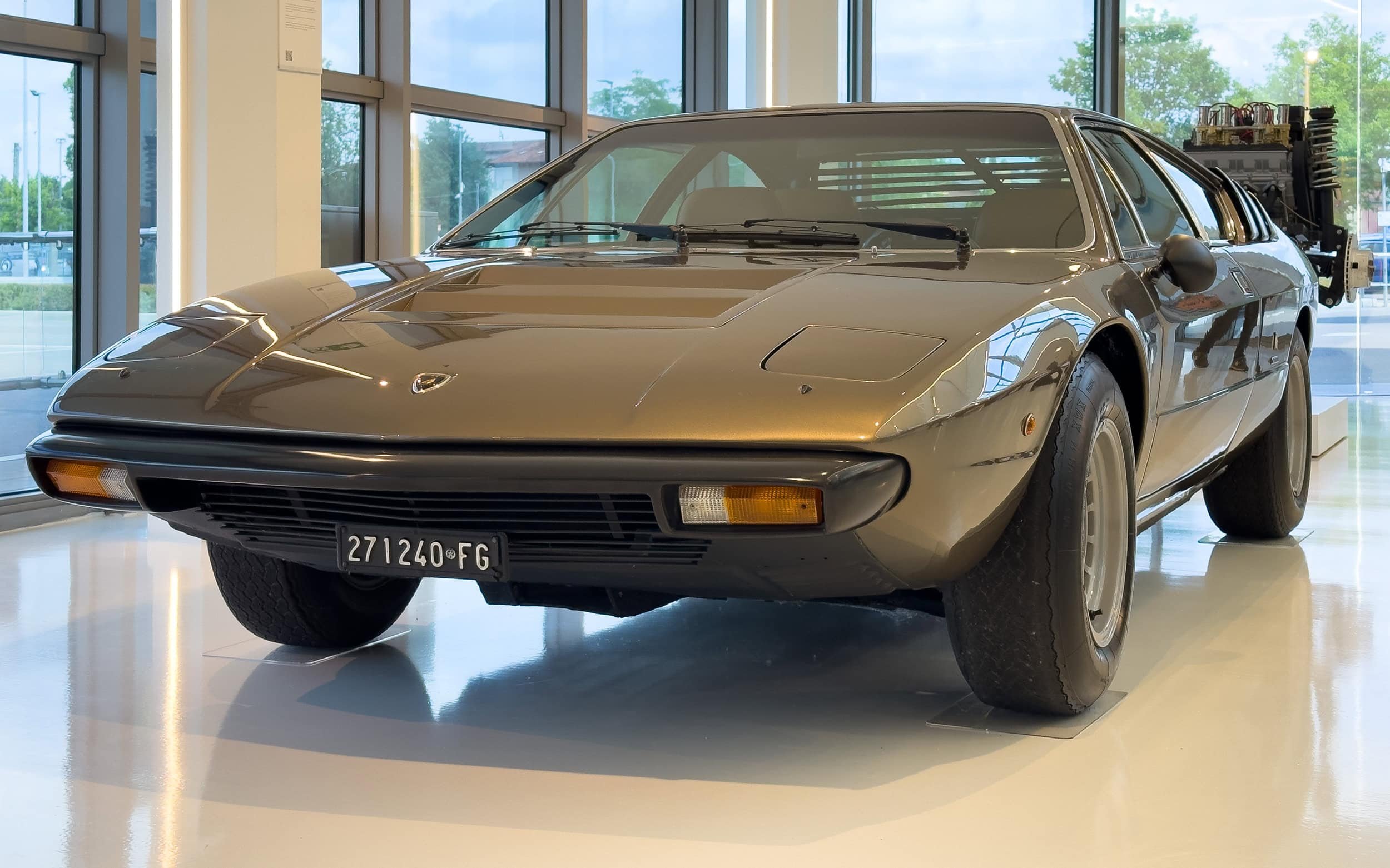 Lamborghini Urraco displayed at the Lamborghini Museum in Bologna, front three-quarter view