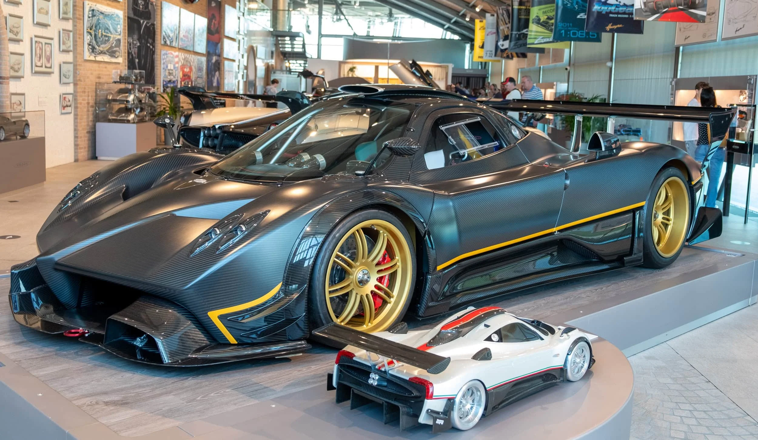 Zonda R along a model car at the Pagani Museum.