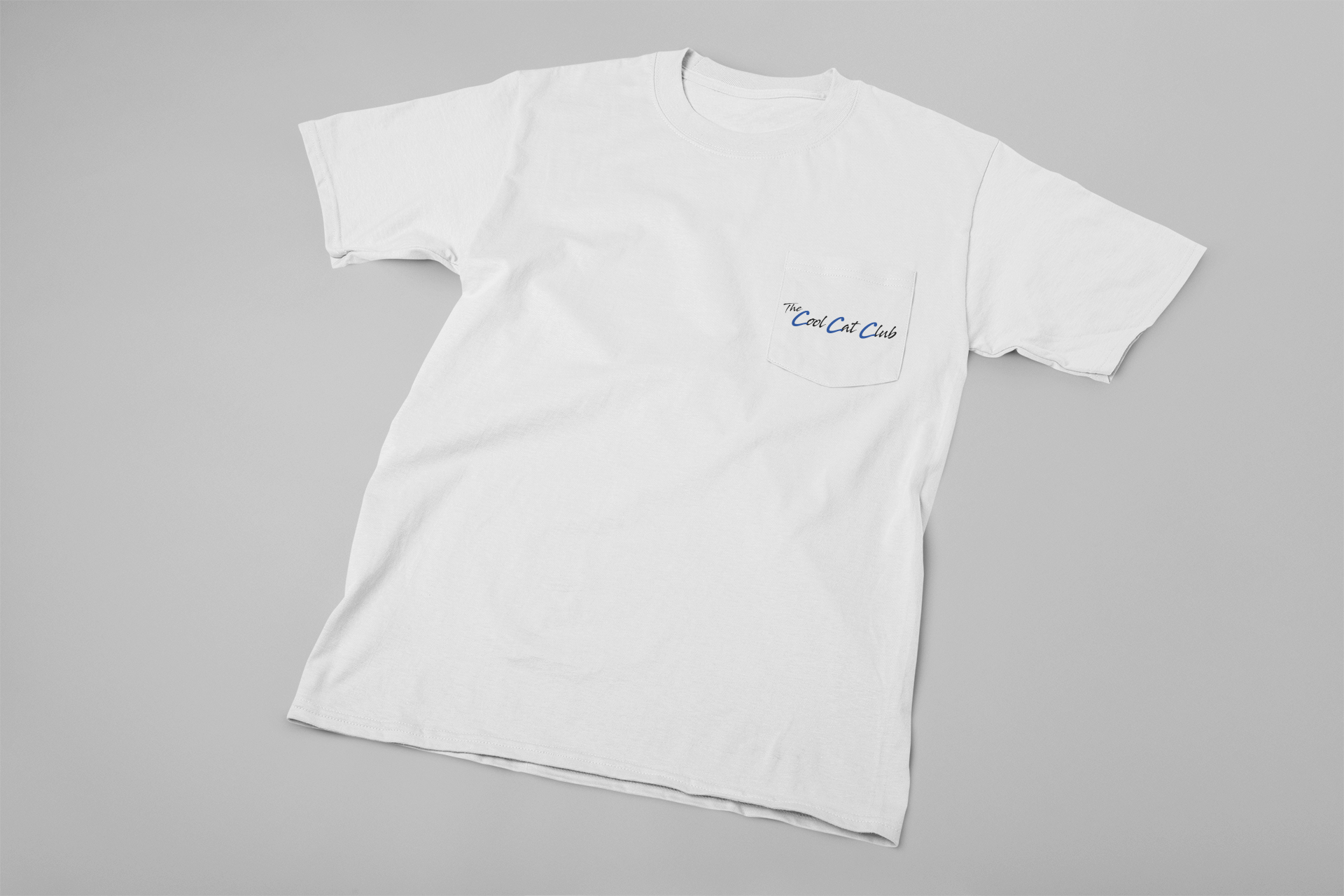 pocket-tee-mockup-lying-flat-against-a-solid-surface-30086.png