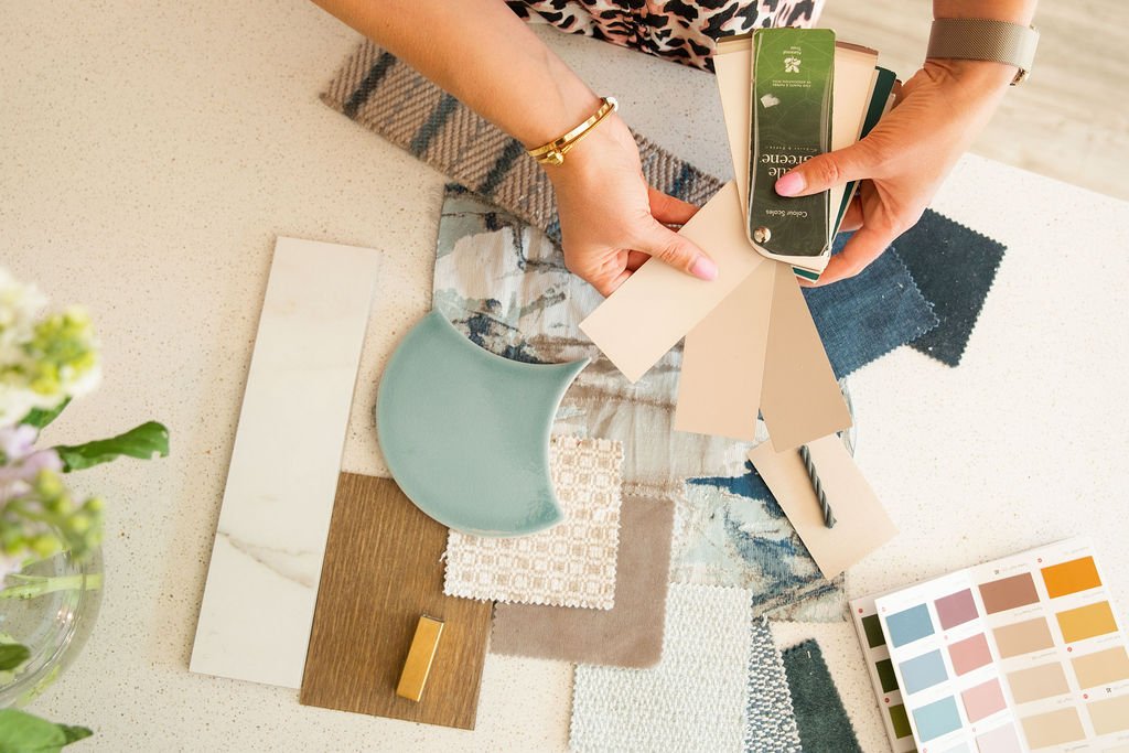 Interior designer reviewing colour and material samples Oxfordshire