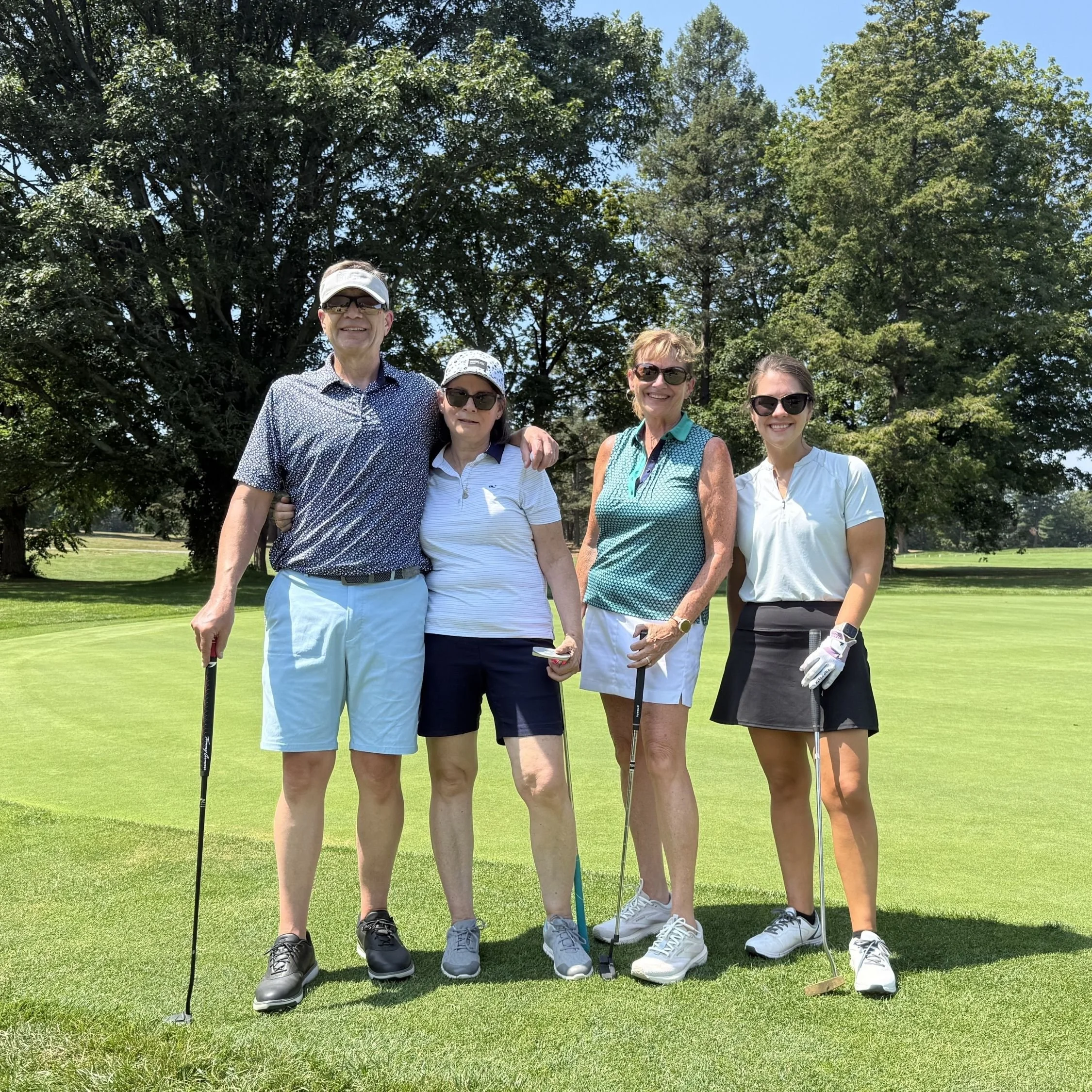 One Foursome (18 holes)