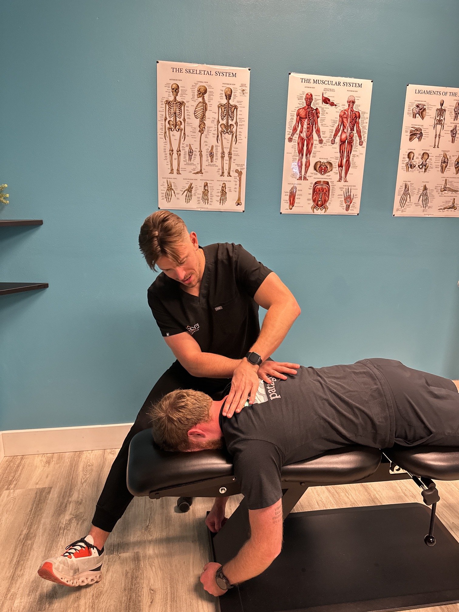Patient performing neck and posture rehabilitation for jaw pain at Evolve Chiropractic in Dripping Springs, TX