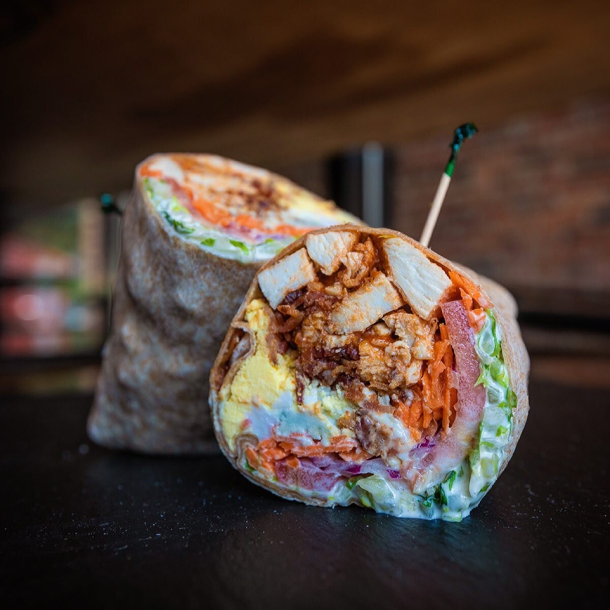 Take a look at Friday&rsquo;s Lunch Special. The Buffalo Cobb Wrap! Grilled buffalo chicken, hard boiled egg, bacon, tomato, carrots, onion, lettuce, blue cheese crumbles and ranch dressing all wrapped up! On the breakfast tip, The Top o&rsquo; The M