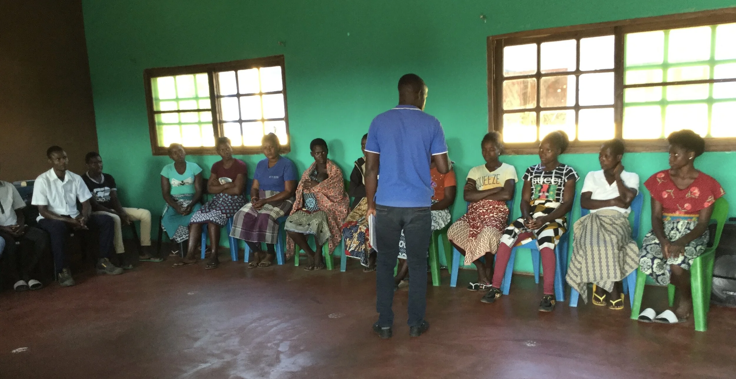 Choir director Tito leading the choir