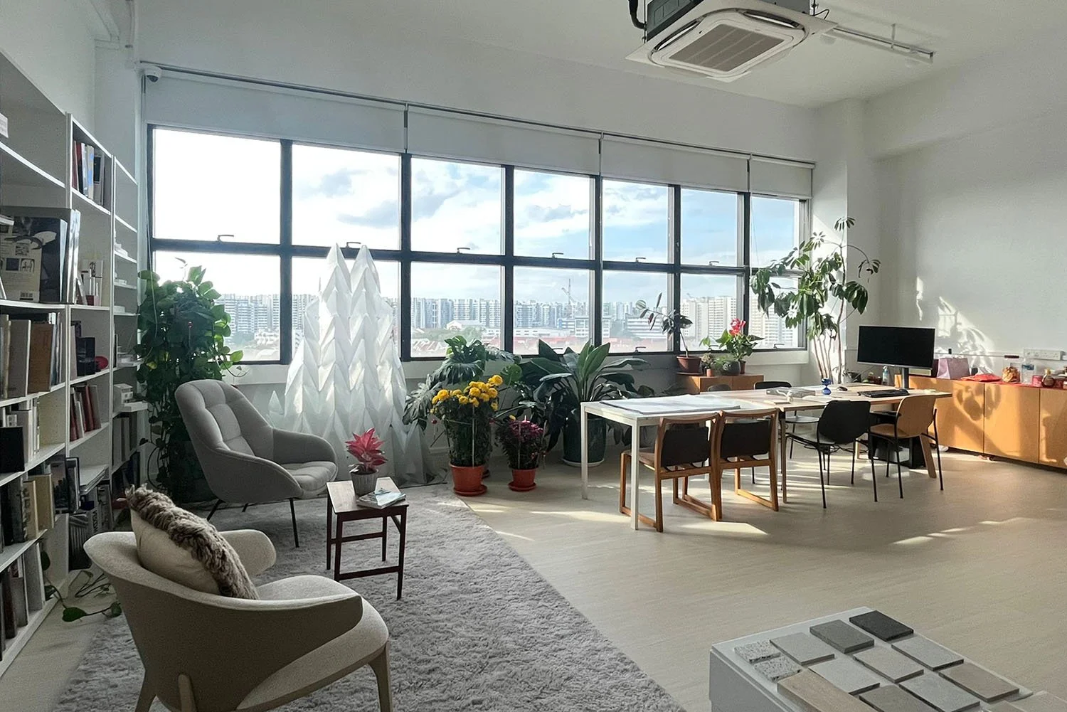 Yume Architects’ office is set up as an atelier, with large windows overlooking the surrounding neighbourhood and a shared work table for gathering, sketching and discussing ideas. It is a light-filled, green space with a convivial atmosphere.