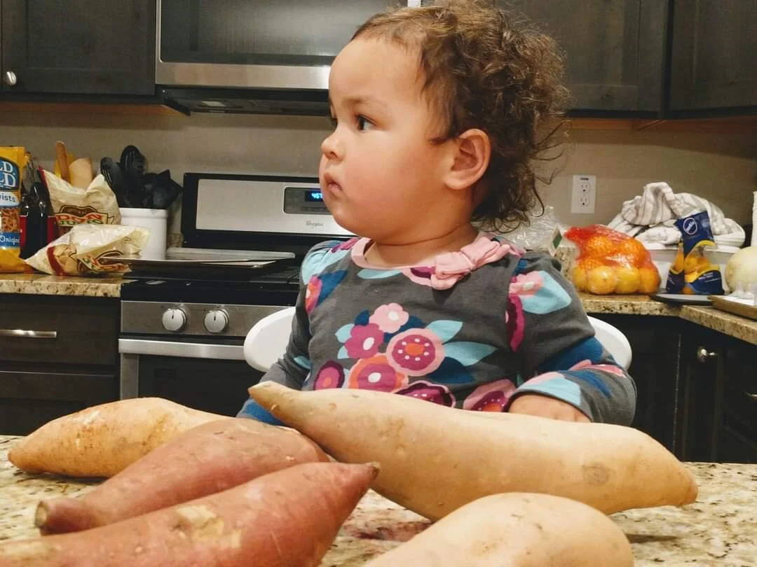 Gratitude Practice 2020 Day 287: Sweet baby girl with sweet potatoes.