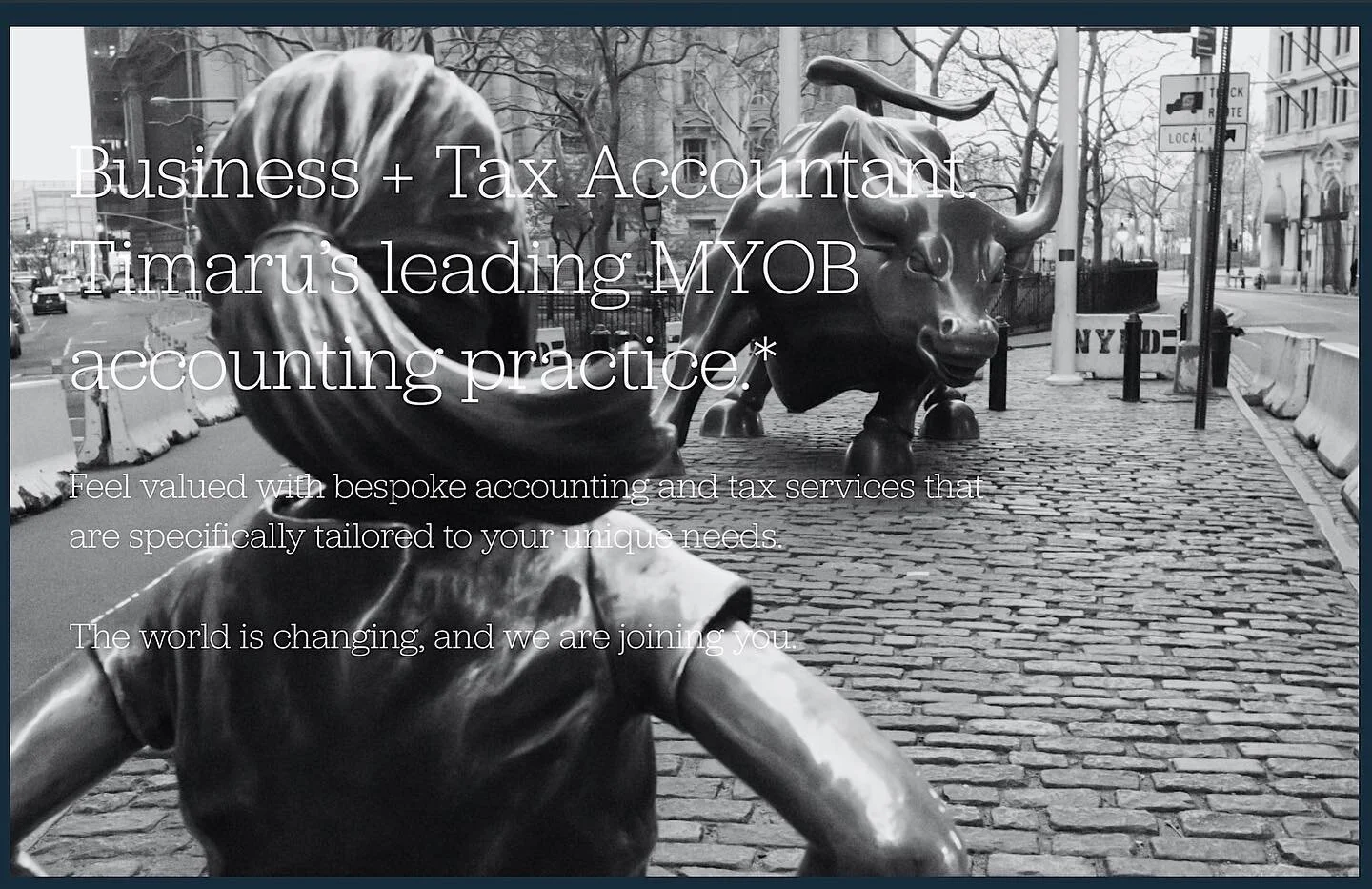 New front page of Lawson Accounting.  Fearless Girl faces down Wall Street Bull