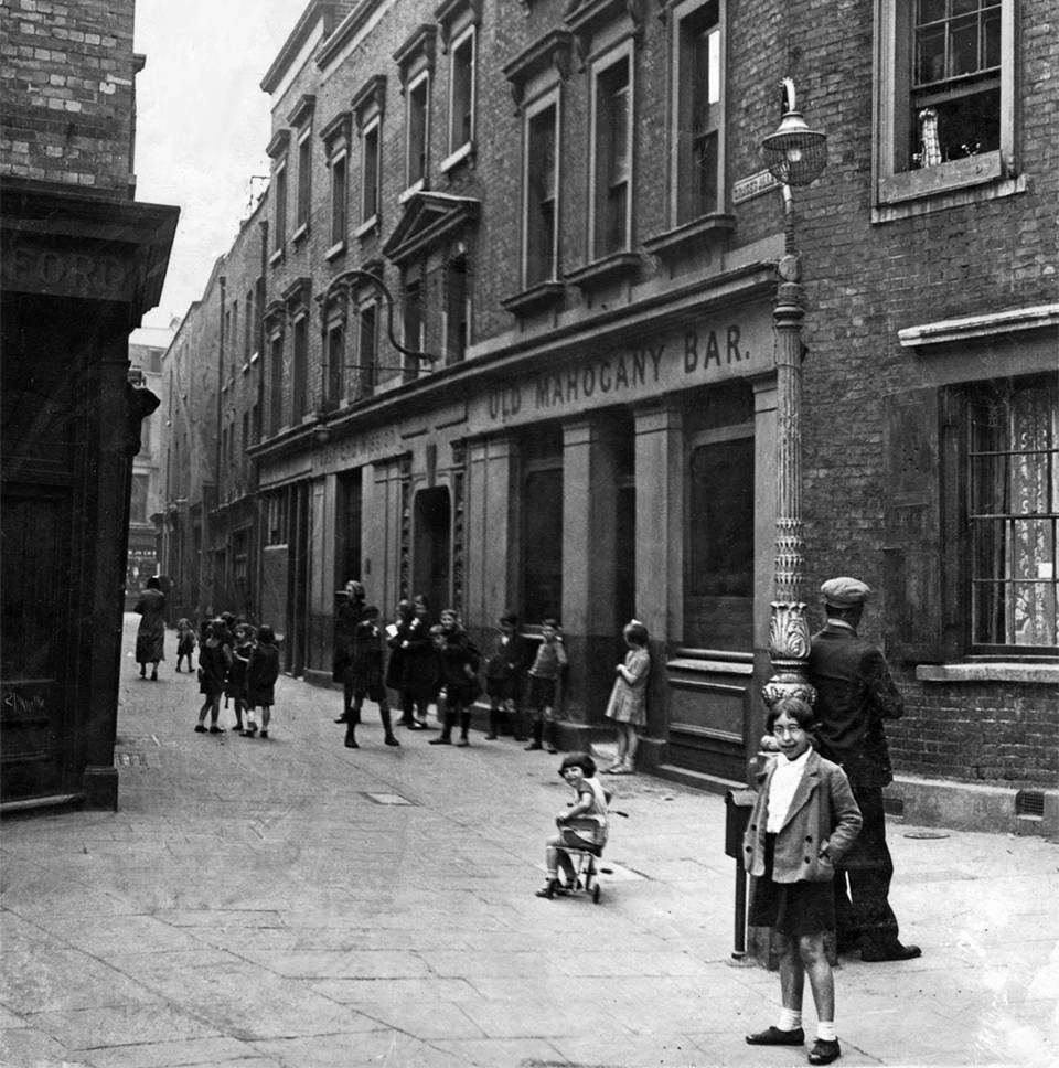 Edited-Street-scene-of-the-Old-Mahogany-Bar,-Graces-Alley,-c.1930s.jpg