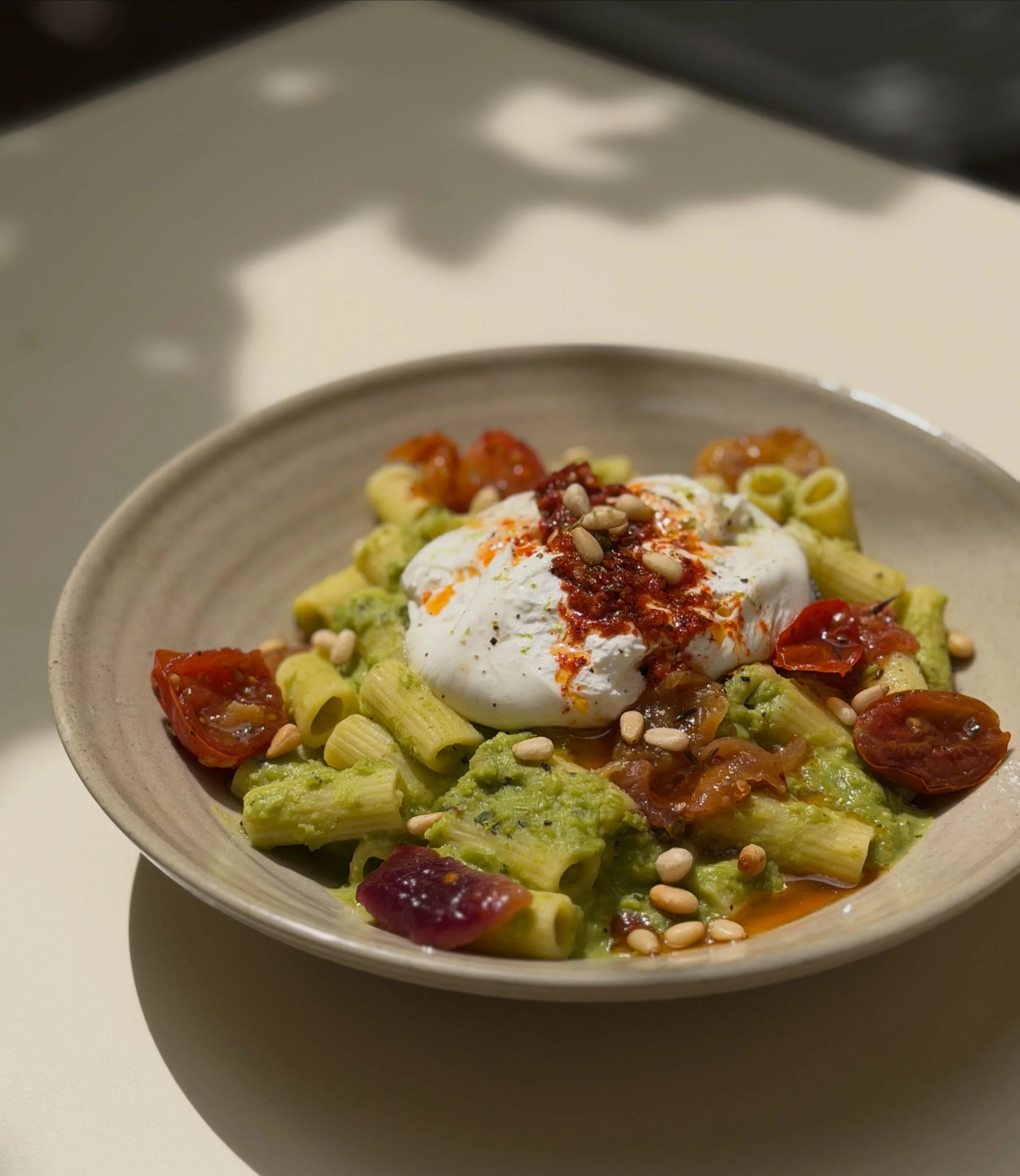New suggestion alert ✨

Rigatoni with peas and mint, topped with creamy burrata, pine nuts, and a chili oil finish. A perfect balance of freshness, richness, and gentle heat. 🍃🌶️