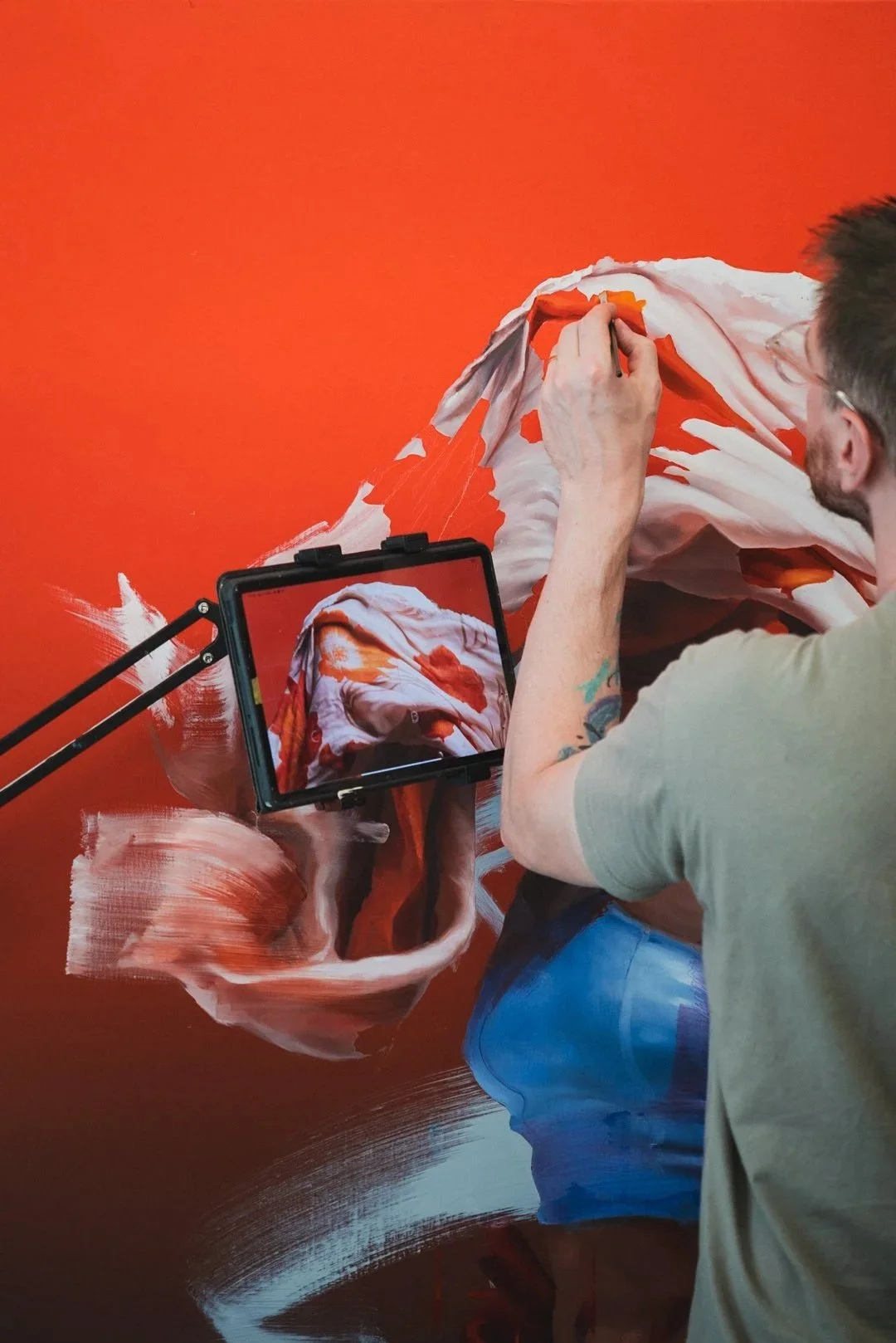 Brussels based artist Spear (Corentin Binard) in his studio, working on a canvas. A project documented by Jules Cesure in July 2024. All rights reserved. Jules Césure, murals and street art photographer, videographer, Belgium.