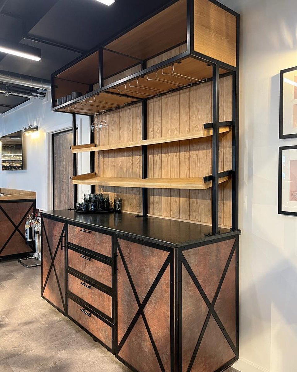 Bespoke display unit for restaurant @mercurenewport 
-
Corten steel veneer with powder coated frames on doors and drawers 
- 
Powder coated steel frame above with oak shelving, glass racks and oak top box for storage 
-
Design by @owenassociatesinter