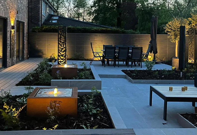 Water feature in corten steel at night in Clitheroe