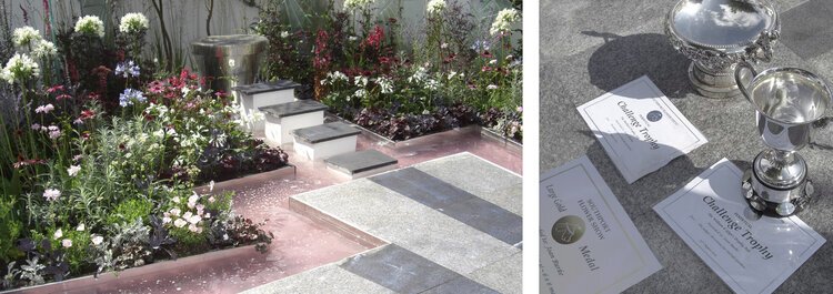 A memorial garden with flowers and a pathway on the left, and trophies with awards and certificates on the right.