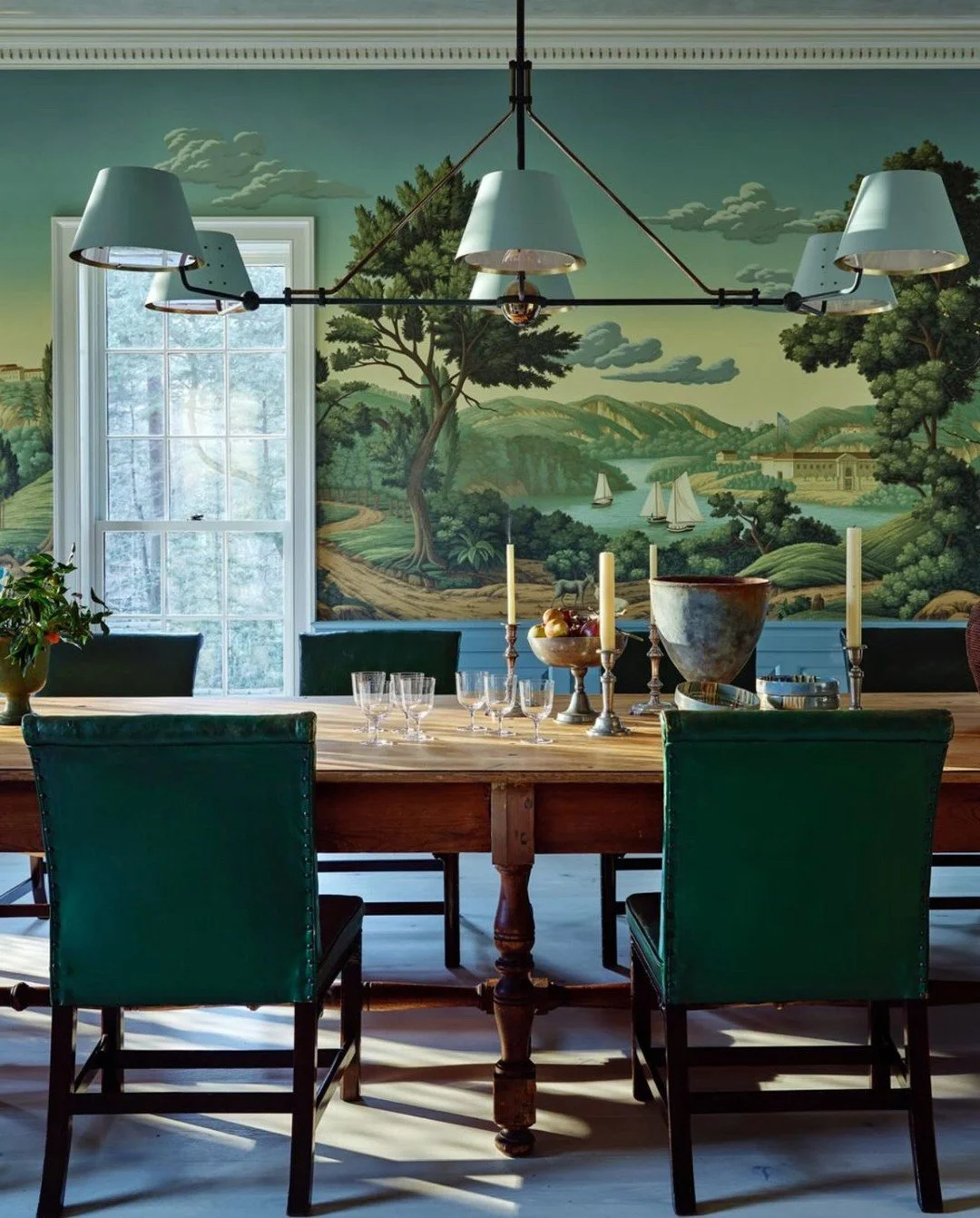 Inspired by the painted riverside landscape as the backdrop of this lovely dining room full of antique details. A reminder that creating the perfect space for gathering includes layers of furniture, lighting & accessories. Our showroom is here to