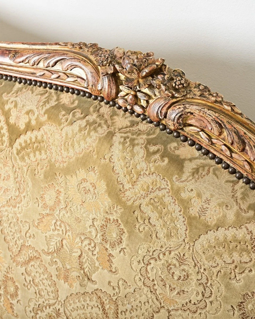 Exquisite French 18th Century Louis XV Parlor Suite is a period giltwood seating ensemble of seven pieces: one camelback sofa, three fauteuils & three side chairs with carved frames, adorned with floral & foliate motifs.
.
Instantly transform