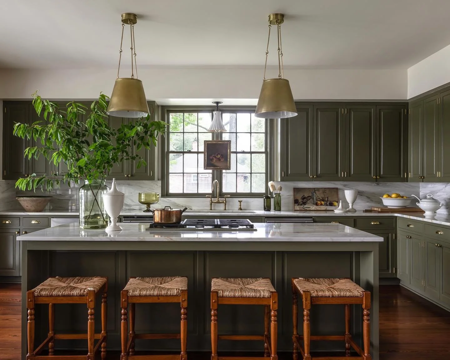 One of my first design projects &mdash; a home in New Roads for the best clients. I poured so much heart into this space, and years later, it still feels like a favorite. The olive cabinetry, the soft veining in the marble, the lived-in textures&hell
