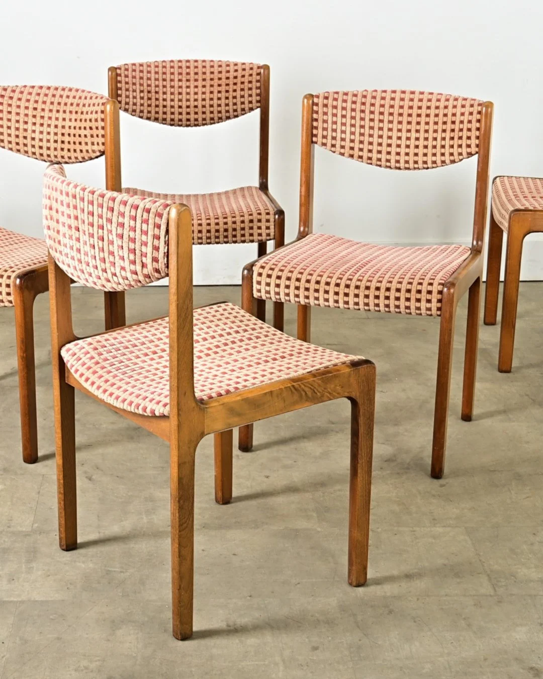 Funky set of six French Midcentury Dining Chairs, circa 1970, with gentle curvature that is both comfortable &amp; inviting.  Armless frames of beech wood are thick &amp; flat in profile, suspending the backrest at the top with wide, slightly concave