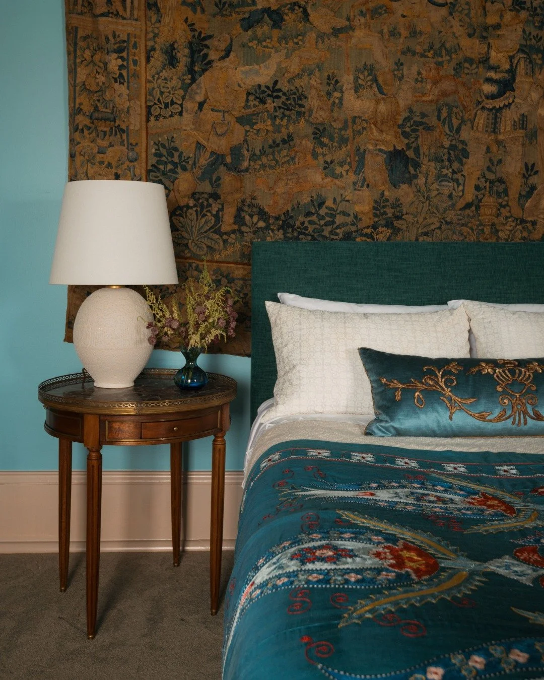 Dreamy bedside details in the New Orleans French Quarter with a verdure tapestry as the backdrop that saturates the space with depth &amp; texture, inspiring rich tones throughout the space, styled with @bvizdesign pillow &amp; draped suzani!
.
Inter