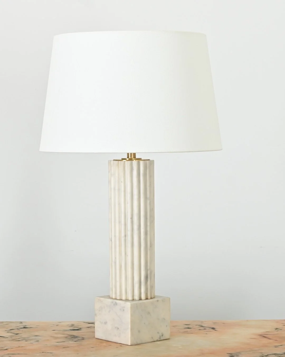 Gorgeous carved Carrara Marble Column Table Lamp, this substantial silhouette has a timeless sophistication to suit any room &amp; appeal to a range of decorating tastes. The lamp base is shaped with a soft, fluted texture reminiscent of architectura