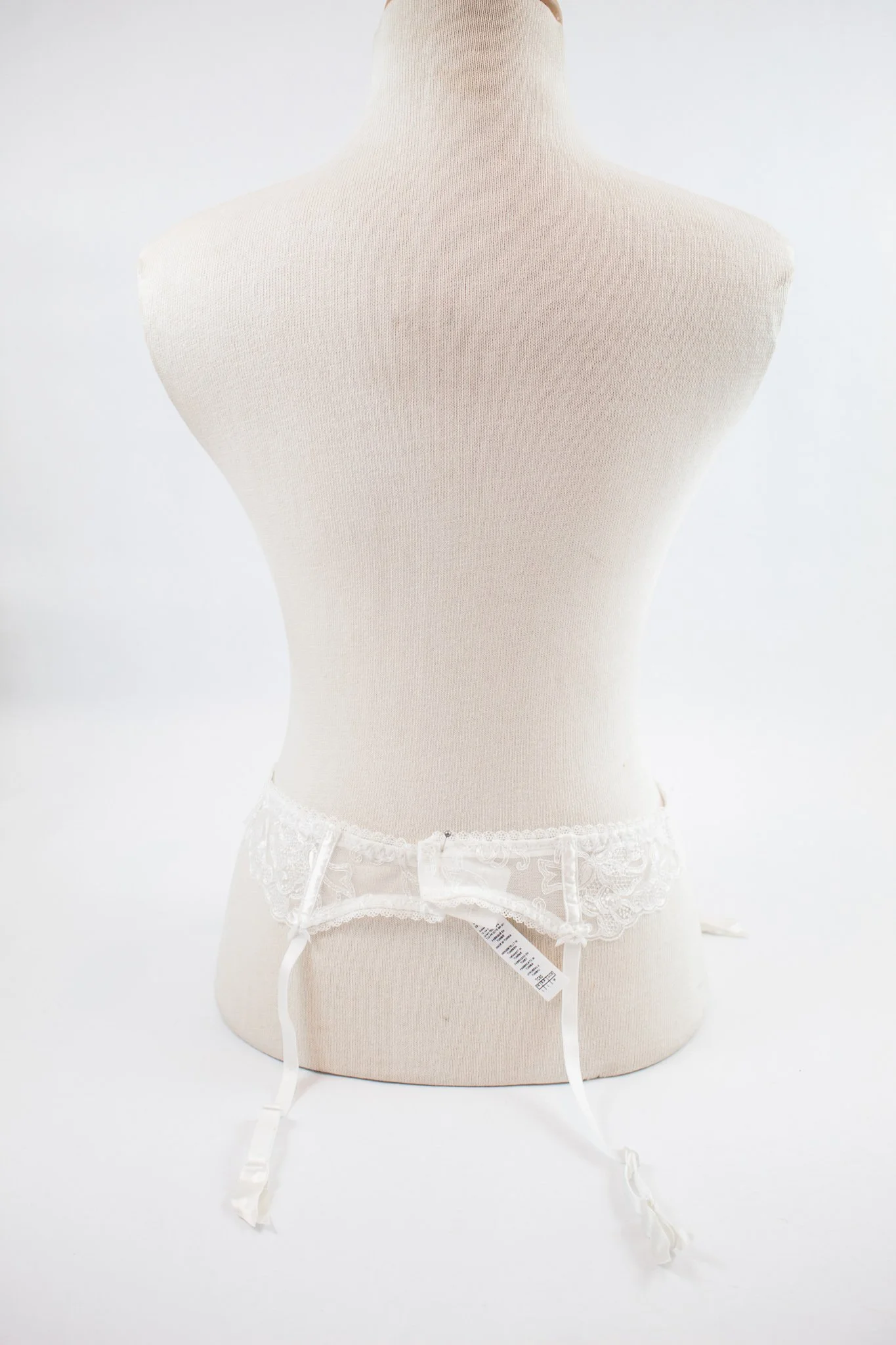 white garter belt How to Add a Garter Belt to Your Everyday Outfit main image 0