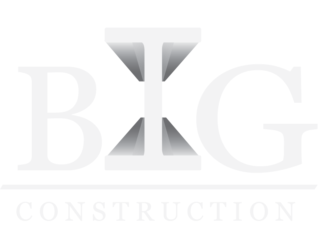 Logo with large letters B and G separated by a stylized column in the shape of the letter T, with the words 'Construction' underneath, all in black and white.