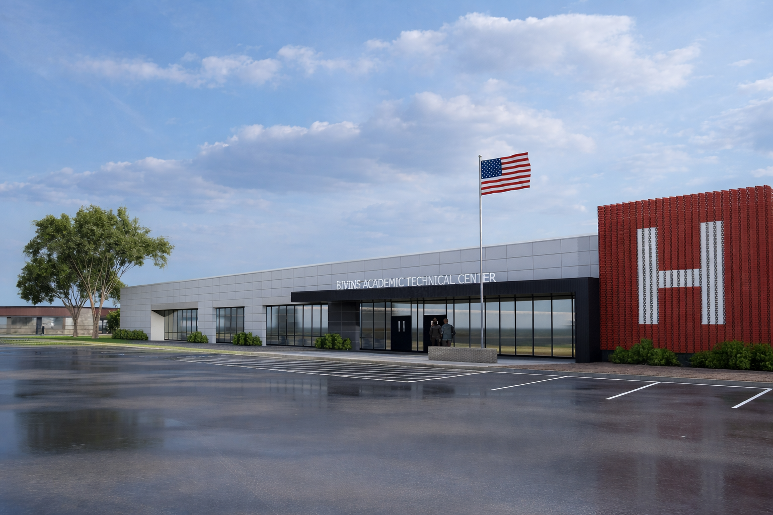Exterior of the BiVINS Academic Technical Center building with an American flag, trees, a parking lot, and a cloudy sky in the background.