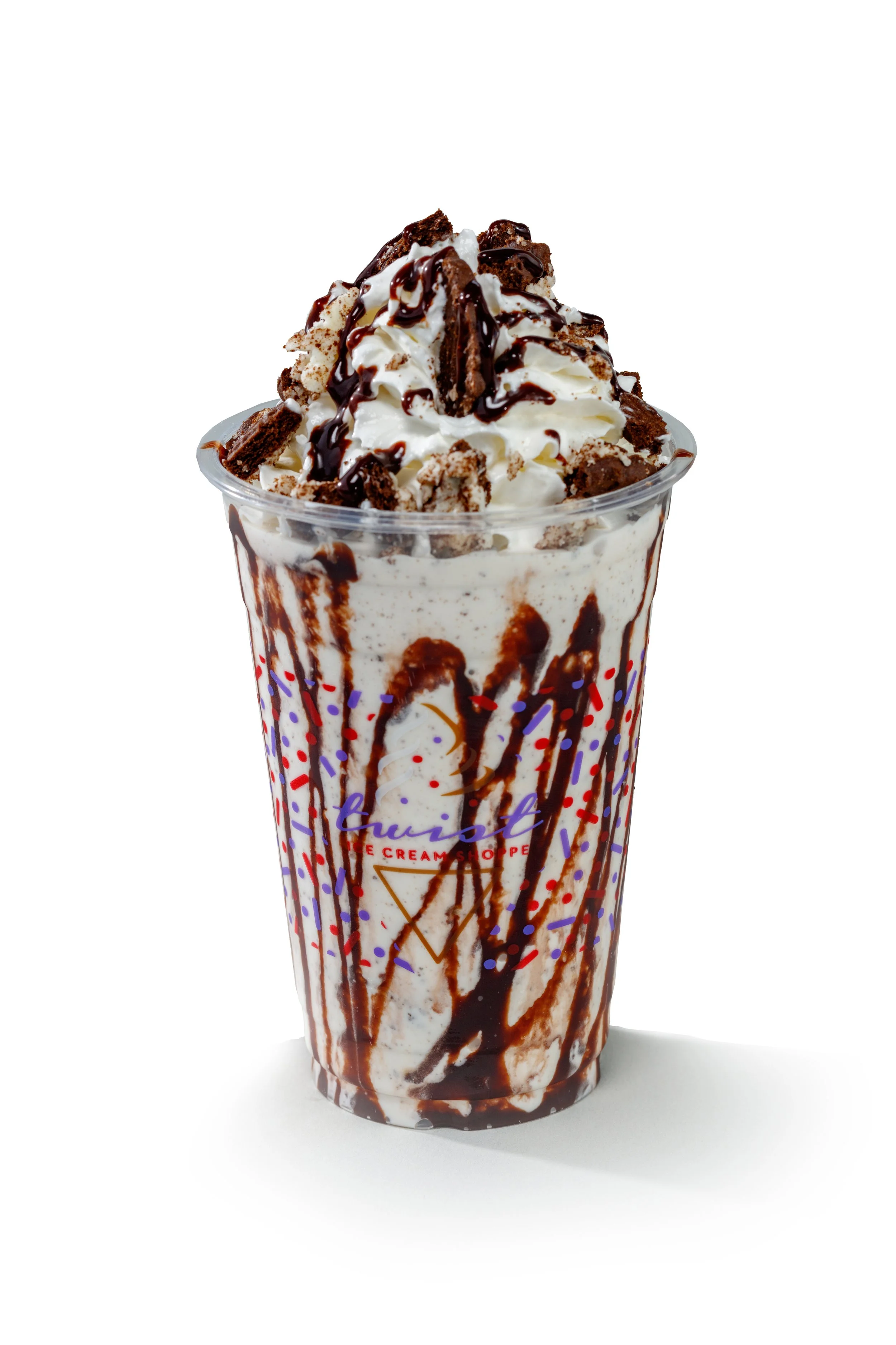THE OREO SPECIALTY SHAKE! A soft serve Oreo shake made with your choice of vanilla, twist or chocolate soft serve ice cream, served in a chocolate stiped cup, topped with chopped Oreos, whipped cream and chocolate drizzle!