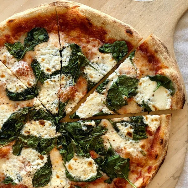 ricotta cream, spinach, black pepper on crushed tomatoes.jpg