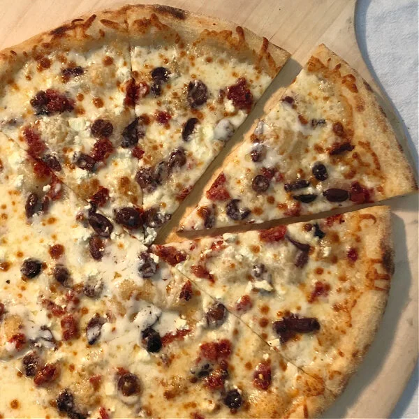 sun-dried tomatoes, kalamata olives, feta, garlic olive oil.jpg