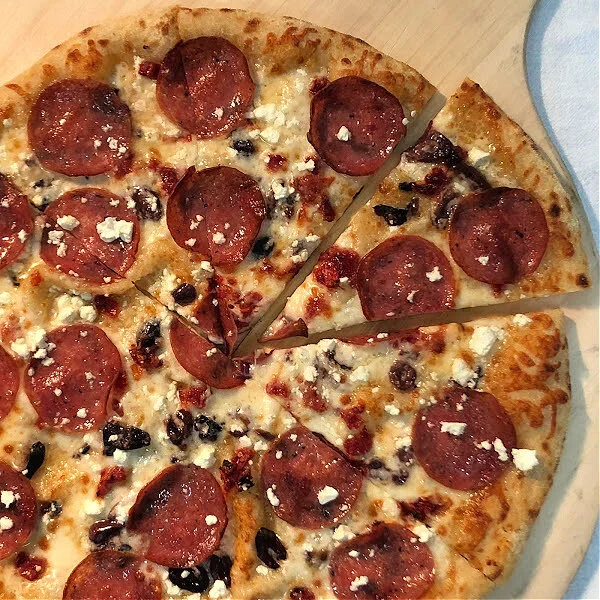 Soppressata, sun-dried tomatoes, kalamata olives, feta, garlic olive oil (1).jpg