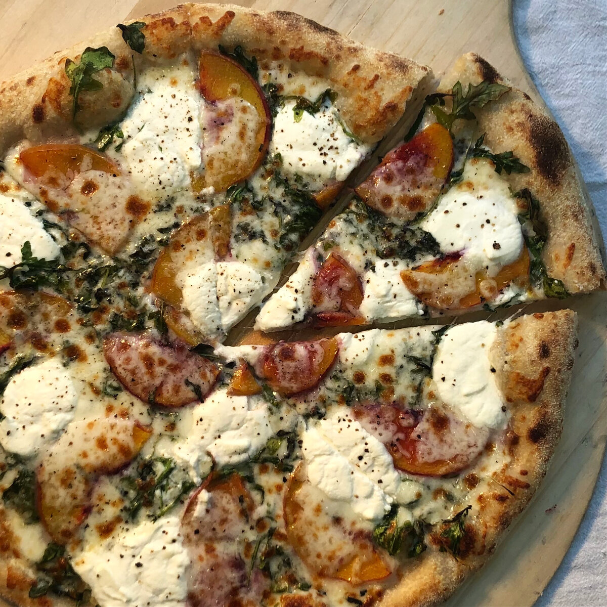Peach, arugula, goat cheese, black pepper, ________ vin.jpg