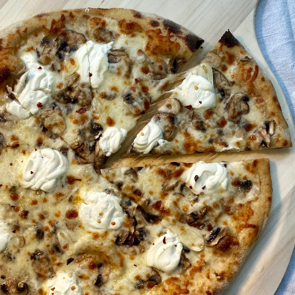 mushroom, shaved garlic, ricotta, chili flake.jpg