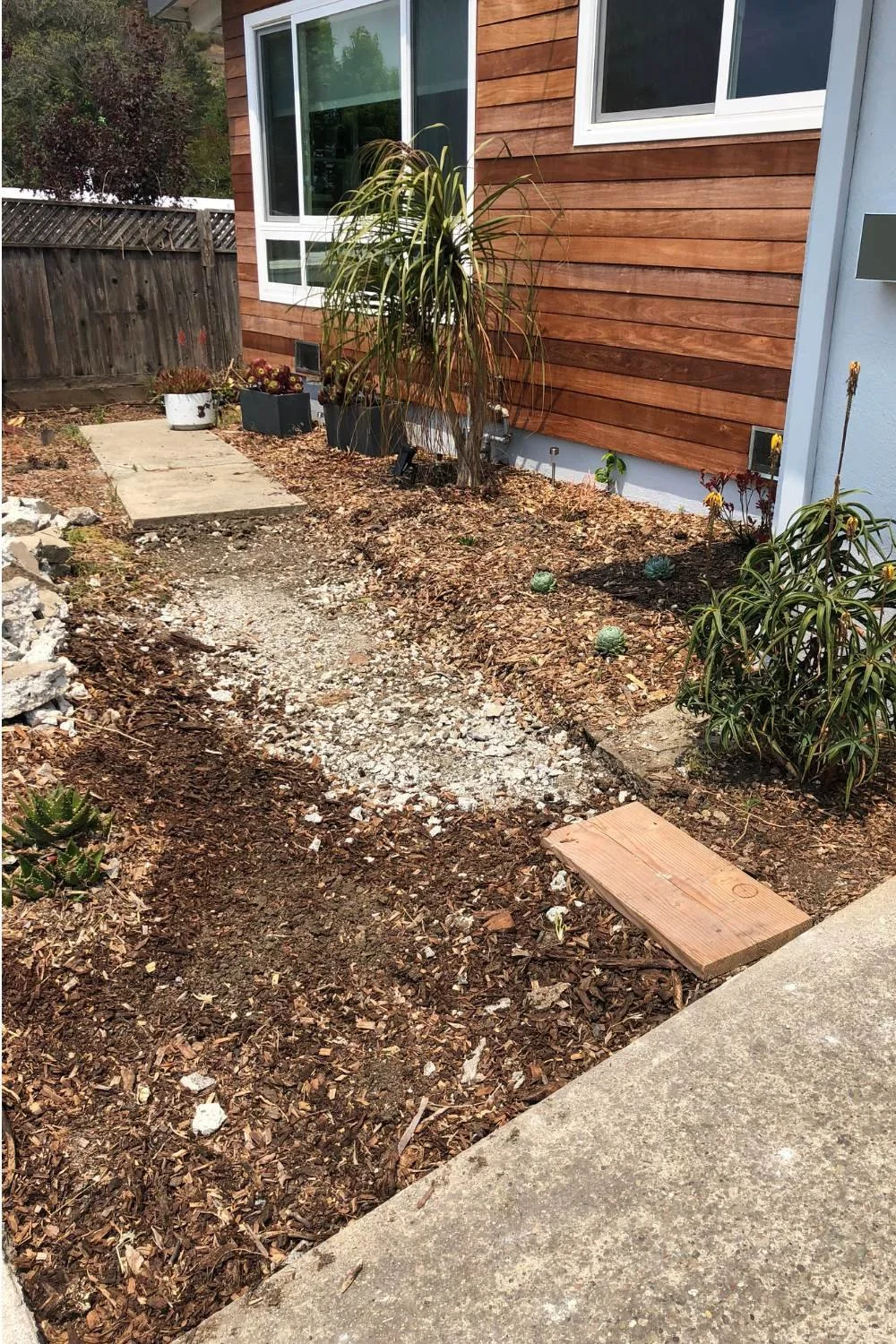 Walkway DIY demo (spoiler alert, new siding)