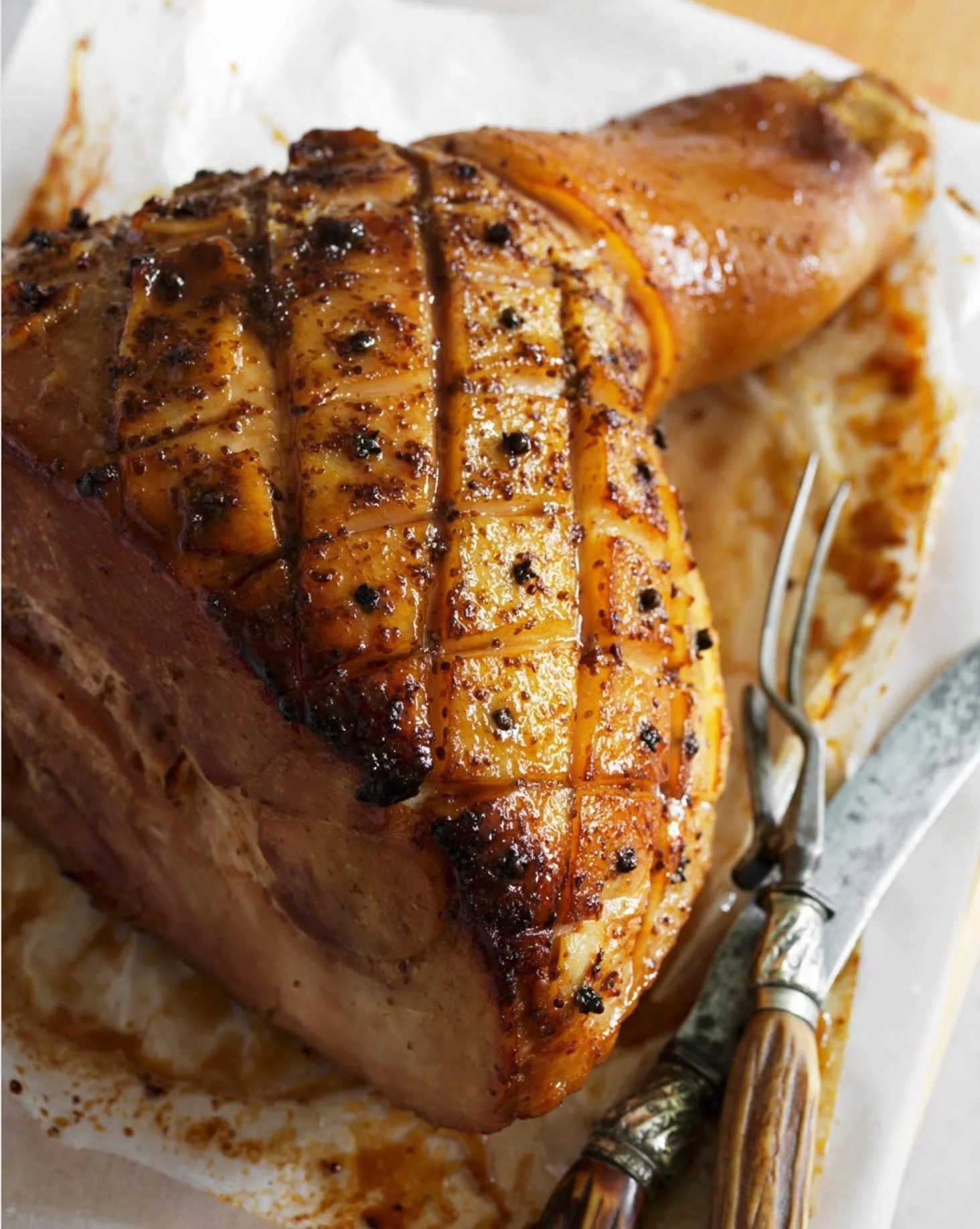 Apricot Glazed Ham

A whole leg of ham, perfectly glazed to golden perfection, makes a stunning centrepiece for your Christmas table. Each slice reveals tender, juicy meat with a delicate sweetness from the glaze, creating a festive dish that&rsquo;s
