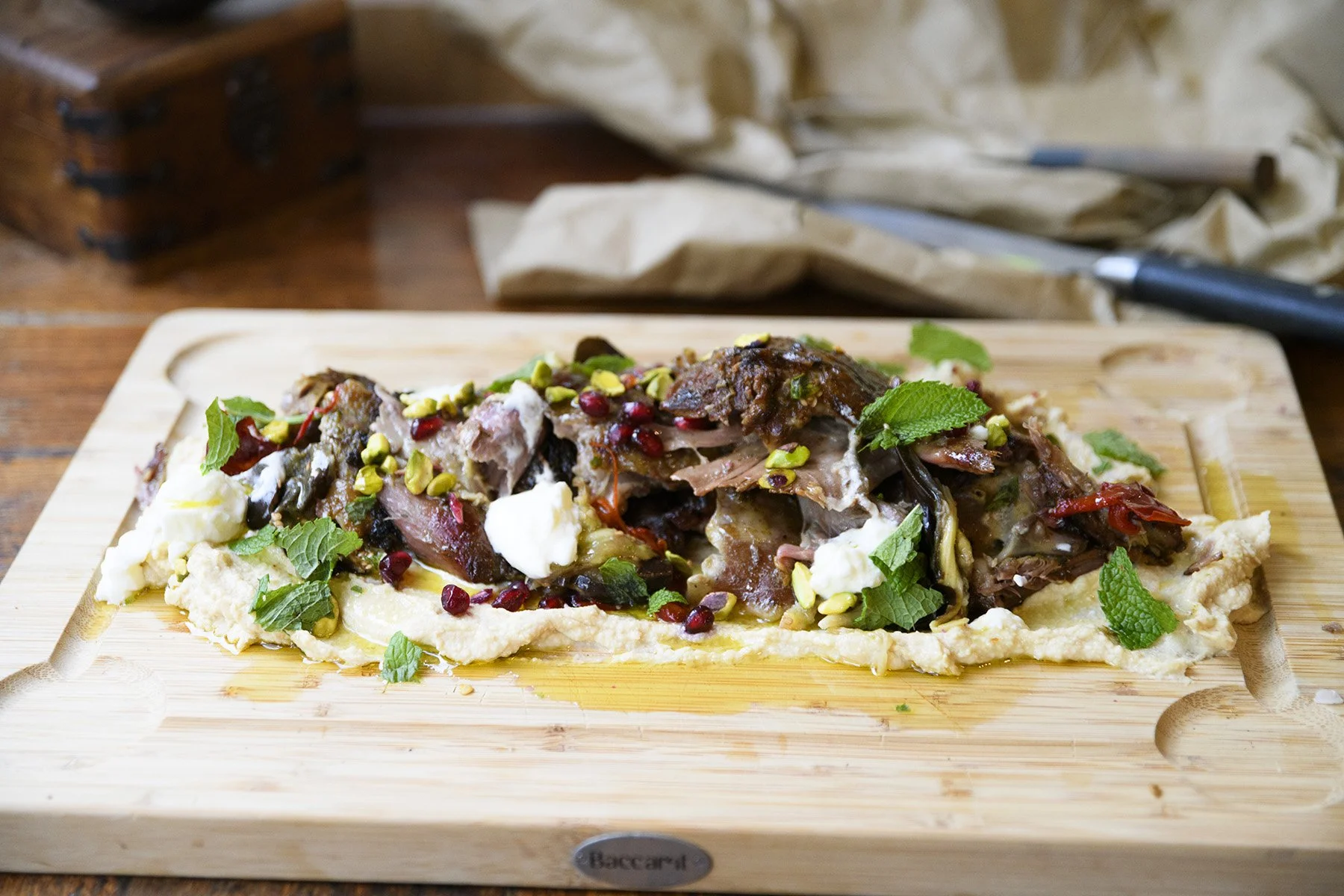 Lamb Shoulder with Hummus and Pomegranate