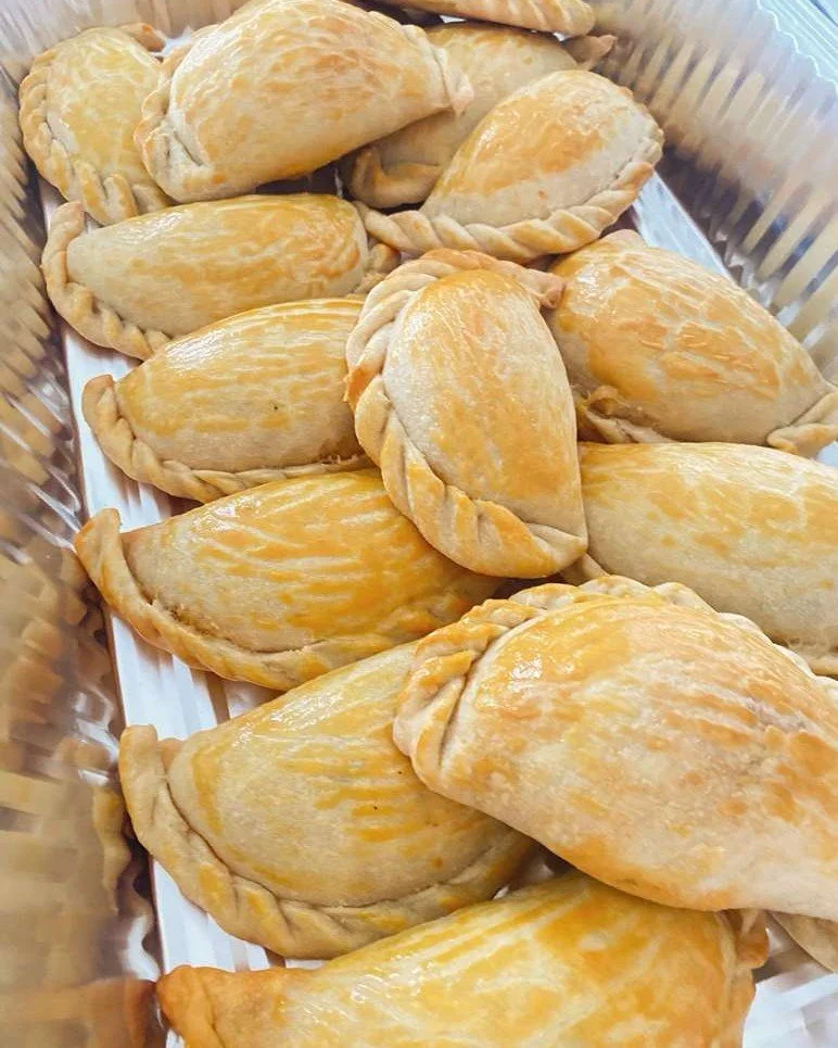 If you're looking for some warm and comforting food, look no further than Peruvian Hands! 

@peruvianhandsvt brings the authentic flavors of Peru to our community with fresh-baked empanadas served with our signature Peruvian yellow pepper sauce, alon