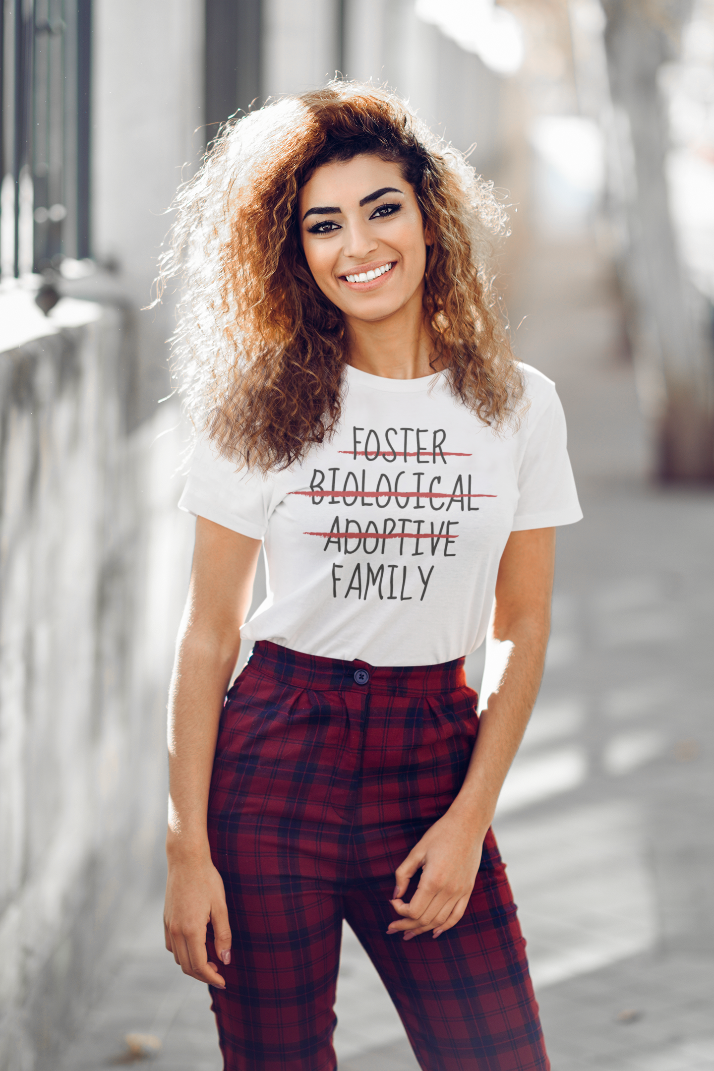 mockup-of-a-smiling-young-woman-wearing-a-t-shirt-on-the-street-39720-r-el2.png