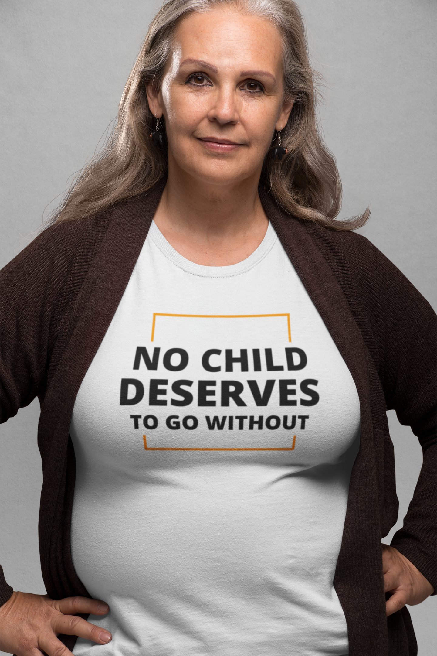 t-shirt-mockup-of-an-elder-woman-at-a-studio-28449.png