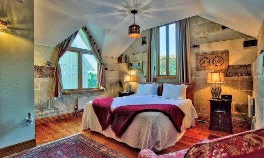 One of guests favourite,  The Nest Room . Decorated with items from Jameses’ international travels.