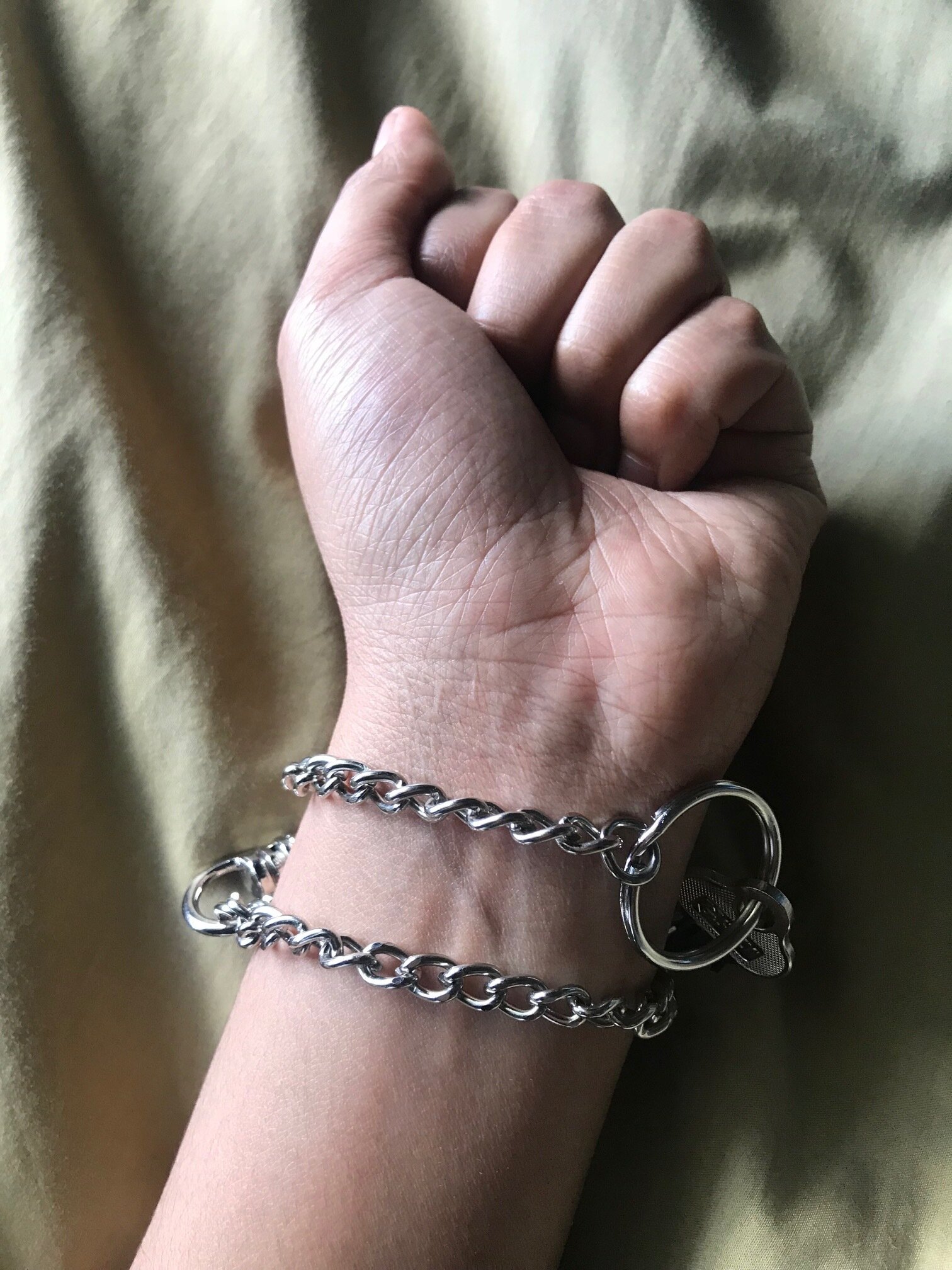 Elizabeth_Photo3 (Chains on wrist).jpeg