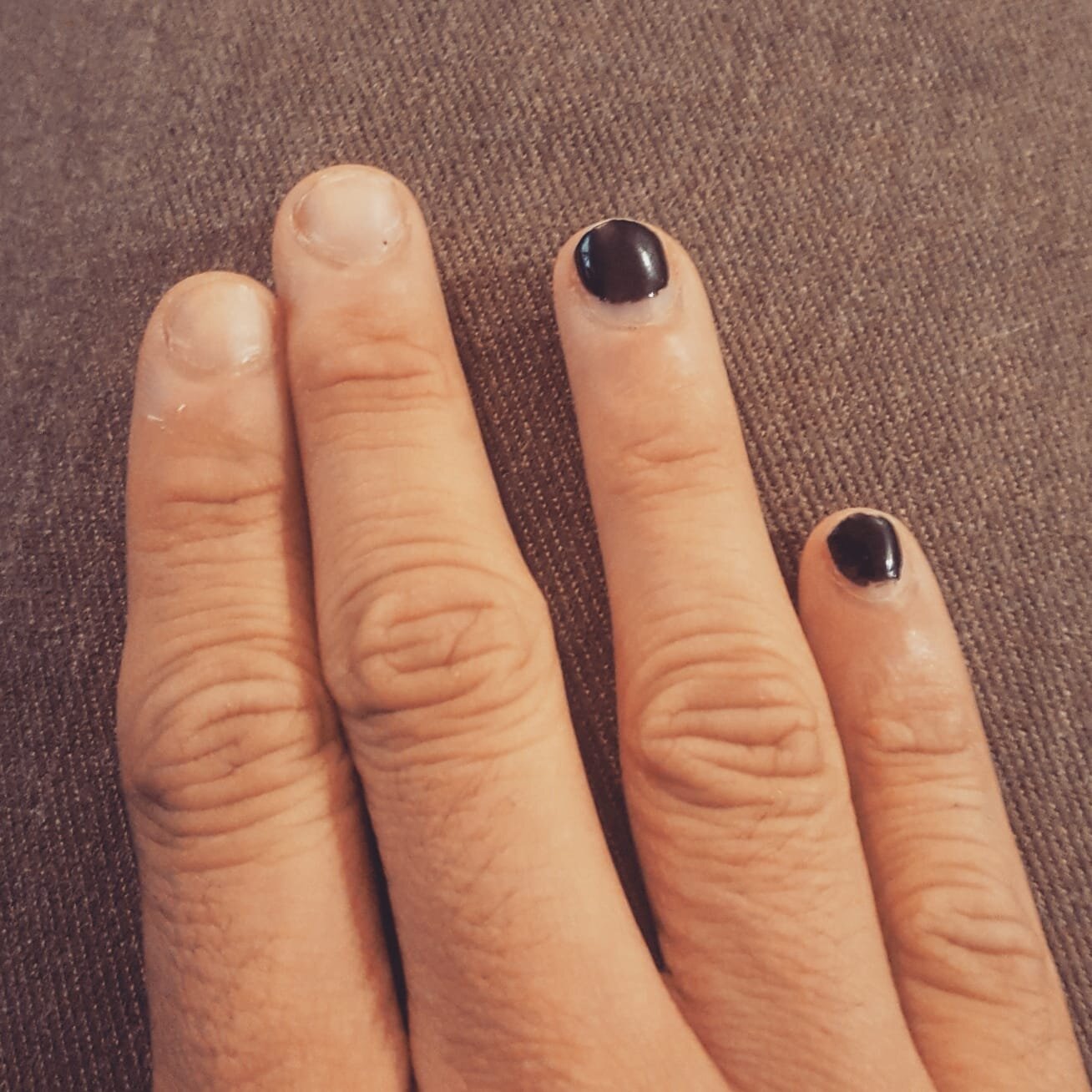 Lin_Photo5 (hand with black nails).jpg