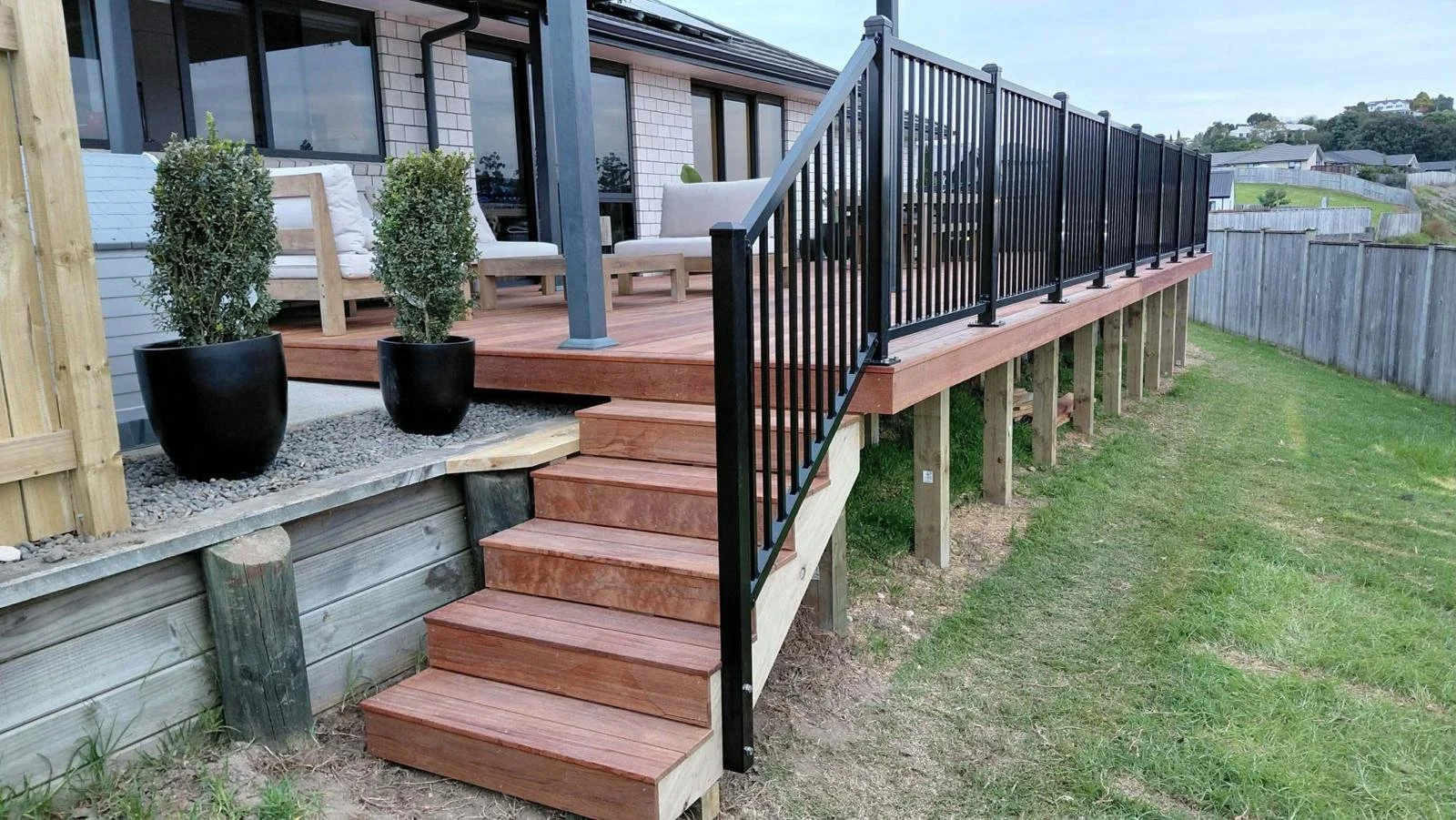 Stairs from the deck down to the lawn