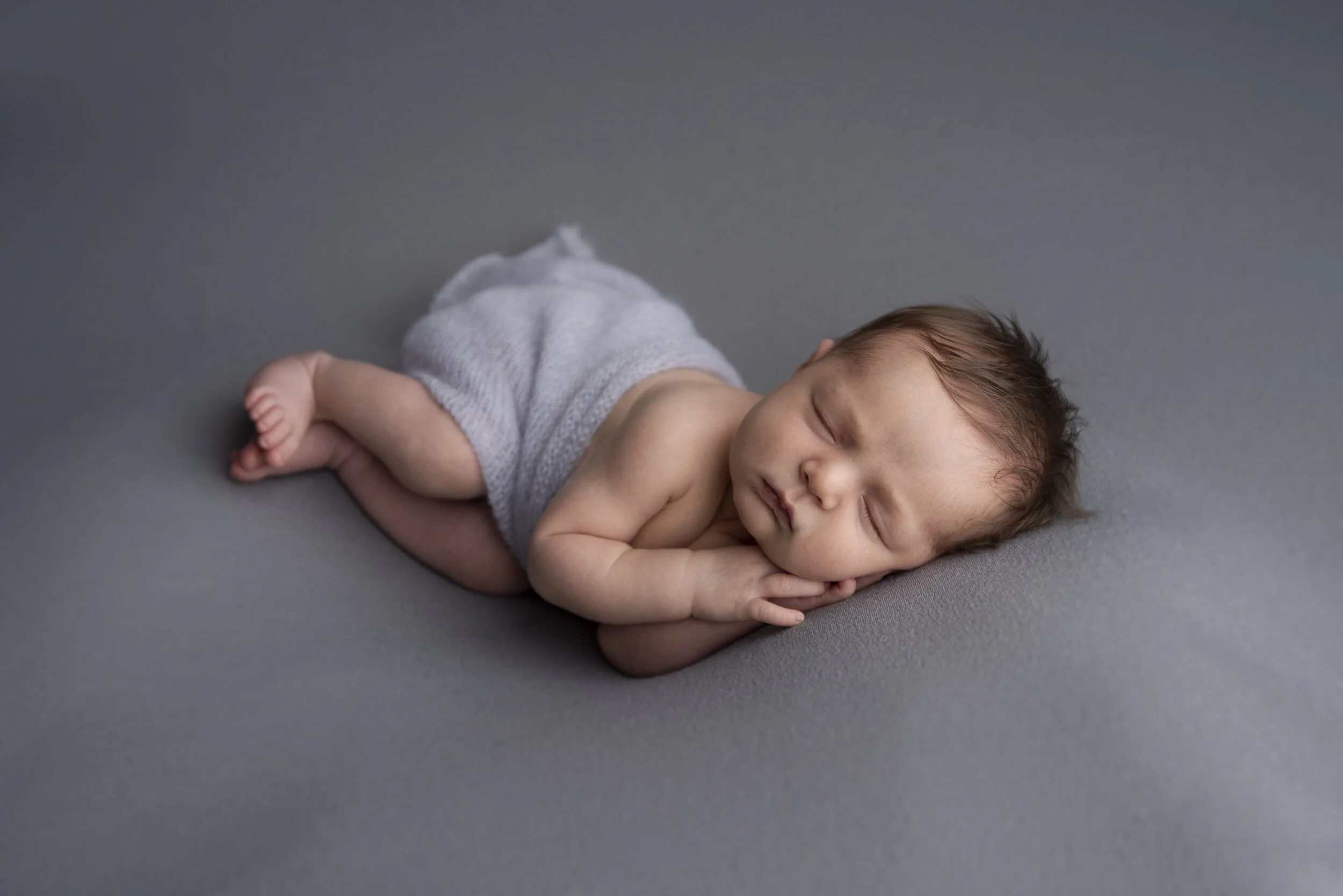 Nyfødt baby som sover.