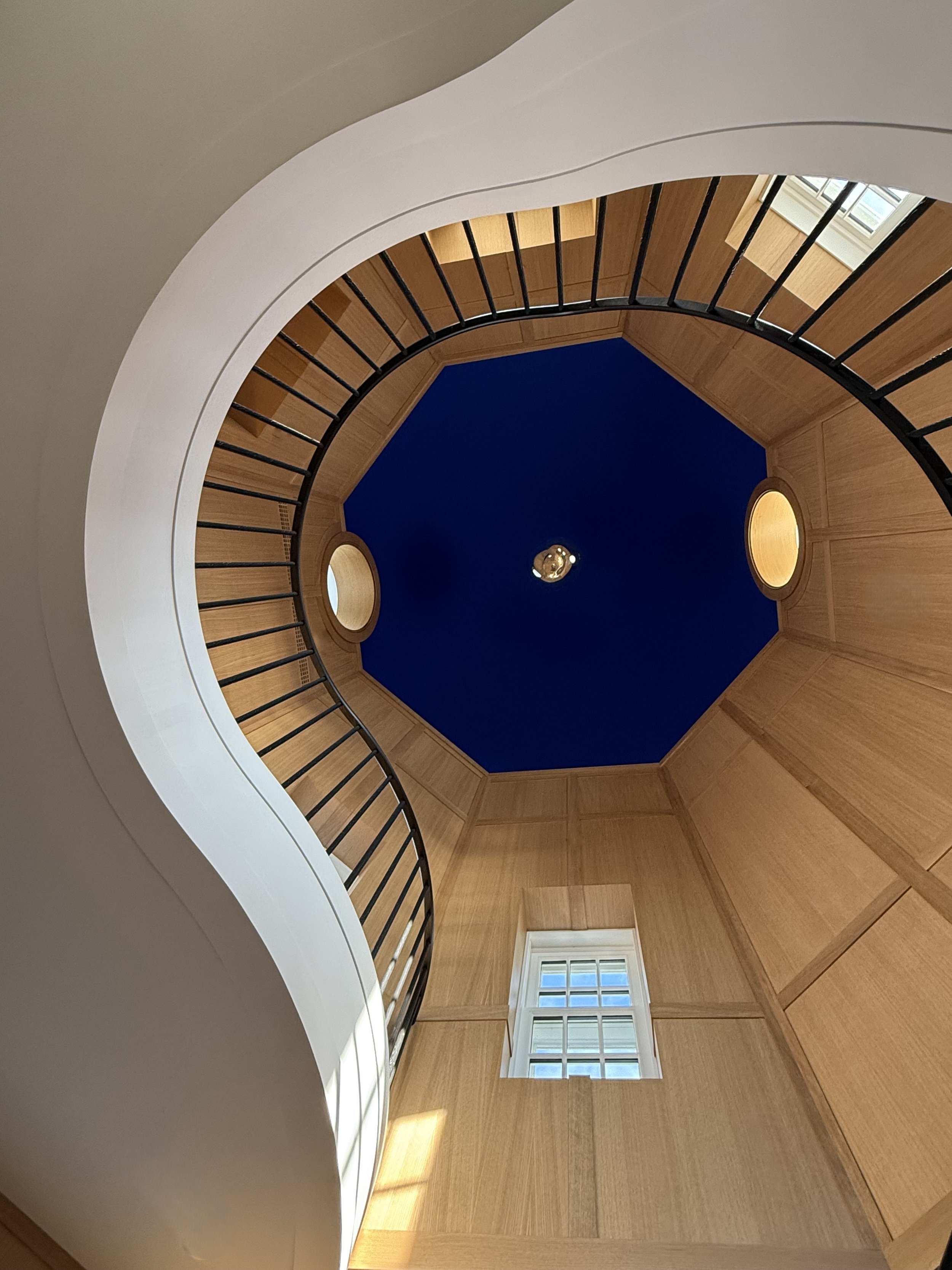 Above, we painted the dome a very special Klein Blue, in homage to the French spirit that is felt in this house - both by the current Interior Designer, Tristan Auer, and by Thierry Despont, who worked on the house for a previous Owner. The Oval wind