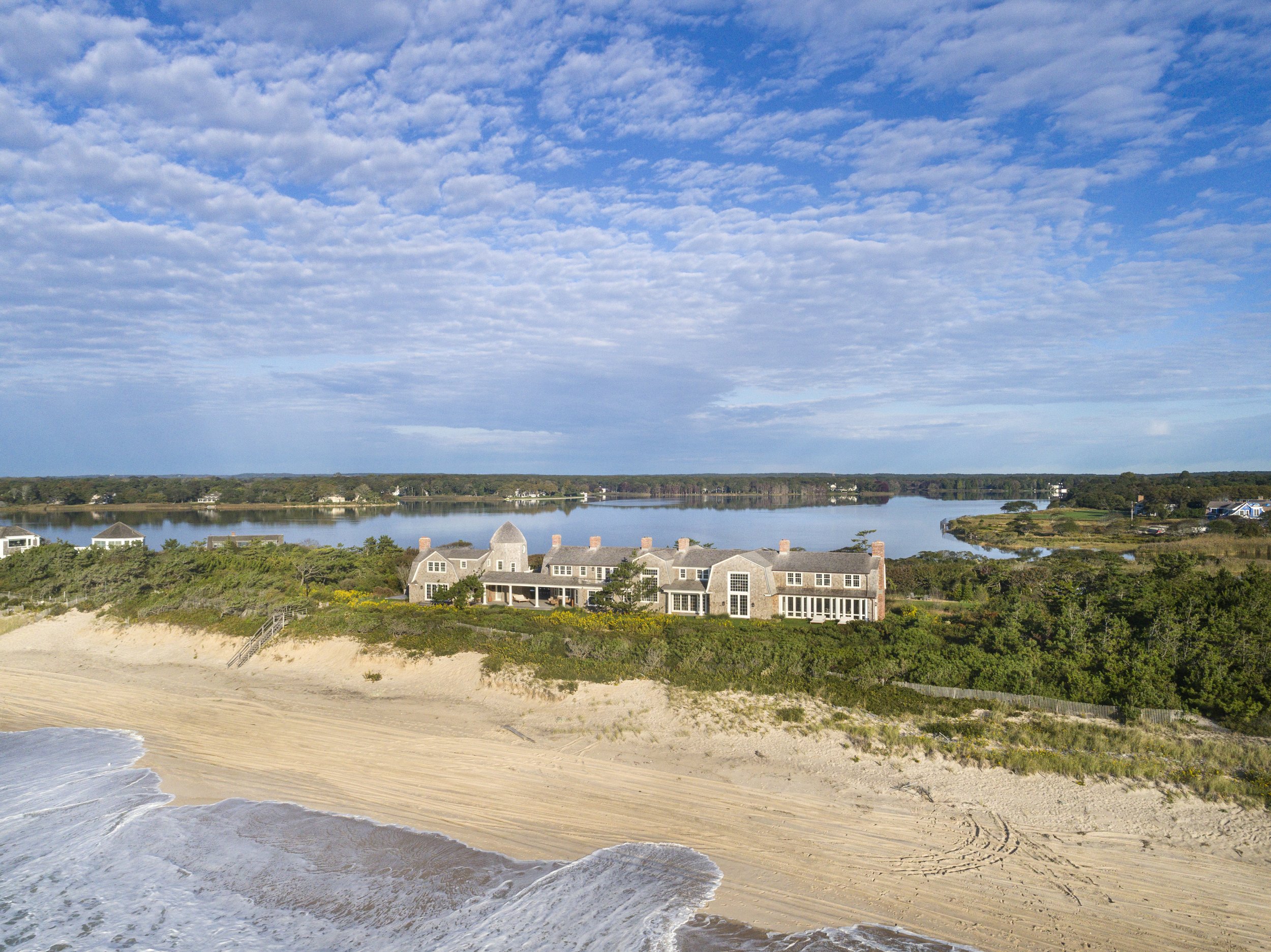 Flanked by Georgica Pond, this home has views of water from all sides.