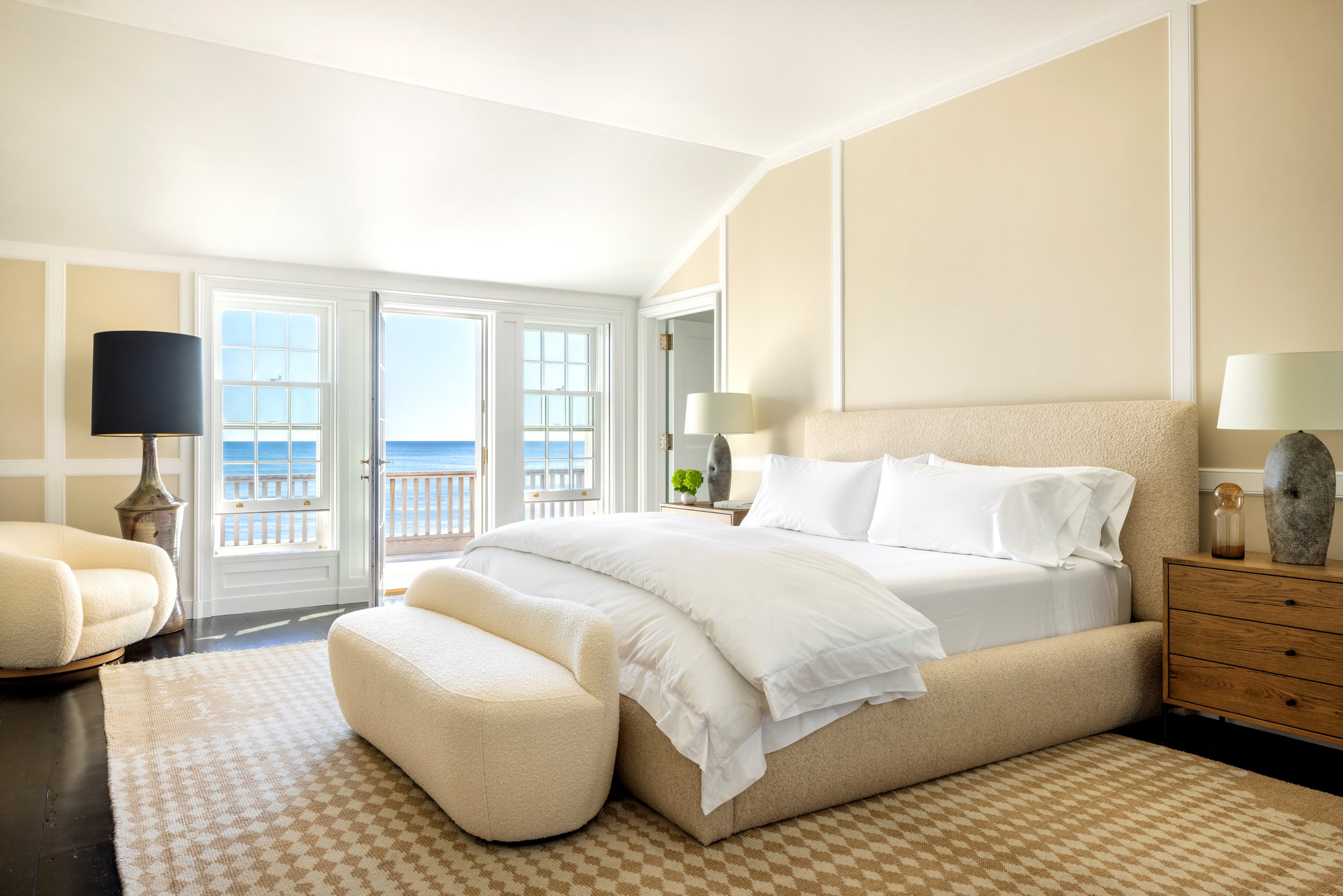 The master suite has a Southern facing balcony with views of surfers riding waves, and another to the North for sunset views of kayakers on the pond.