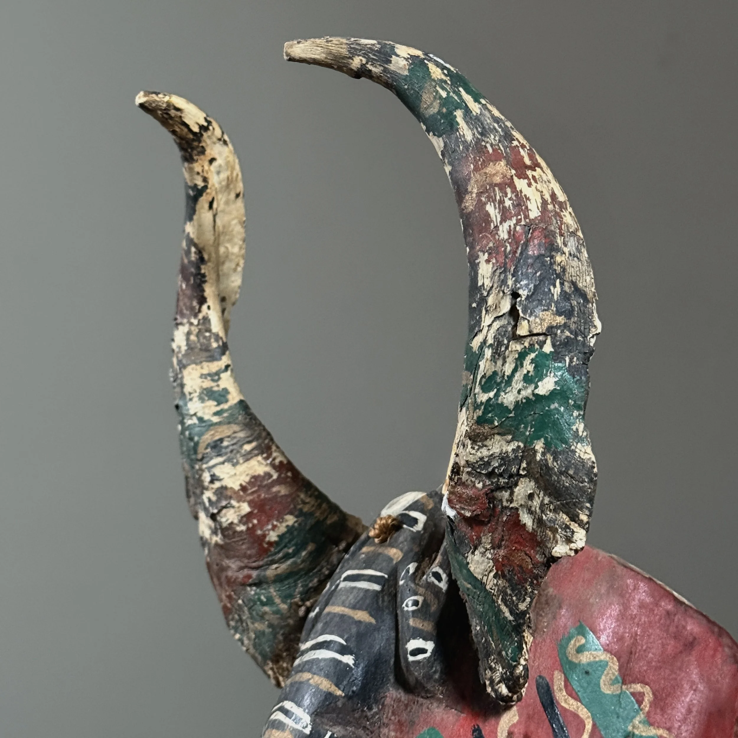 Detail of the organic horns and their attachment to the wooden form.