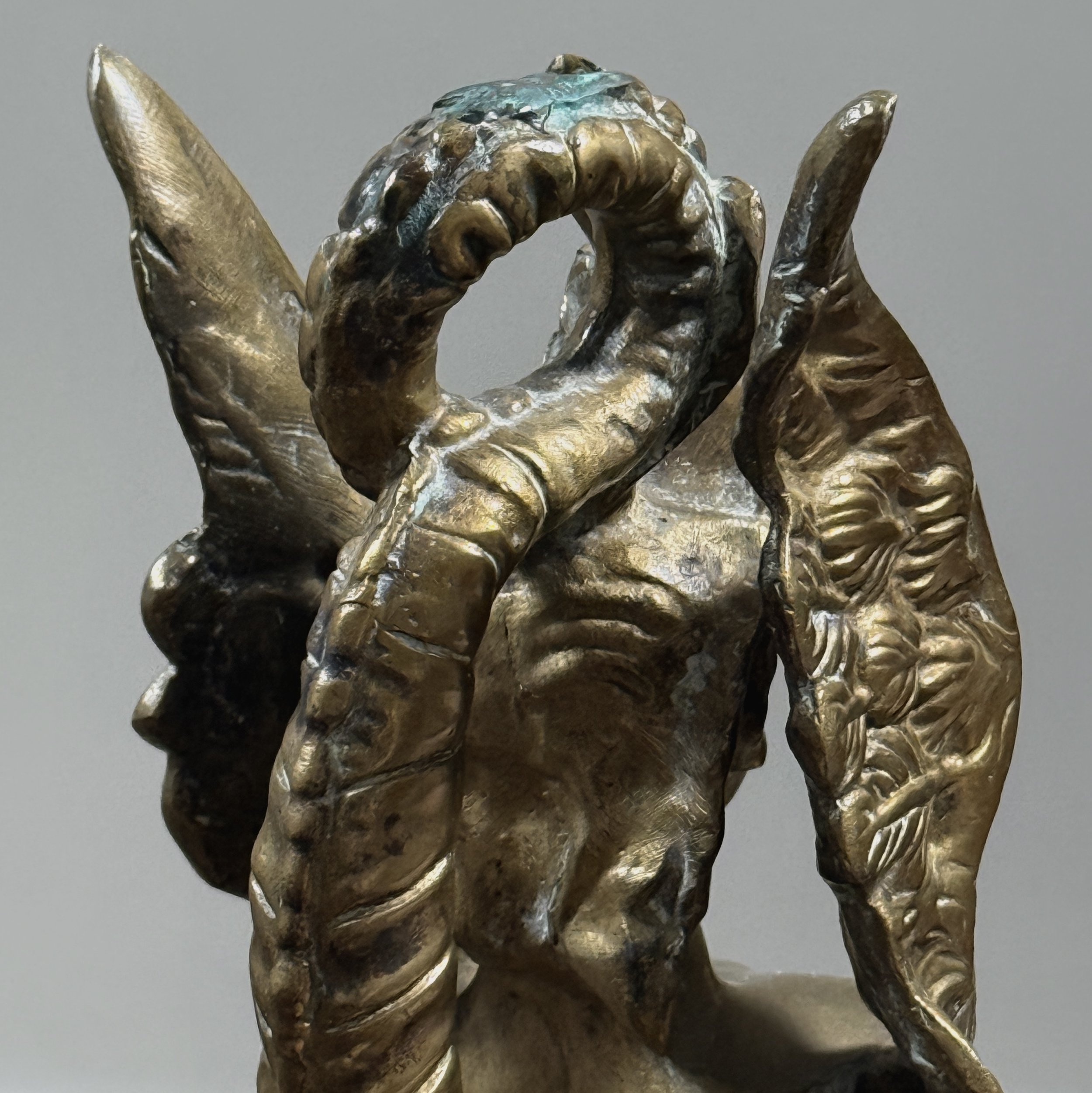 Detail view, pair of brass Melusine sculptures, Neoclassical style
